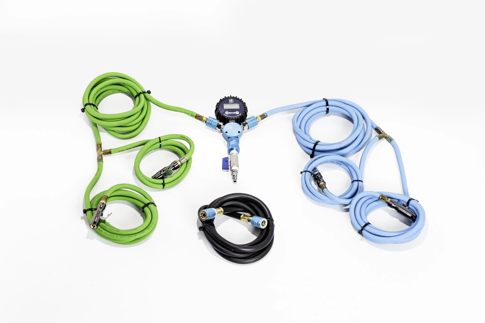 Colorful coiled hoses with connectors on a white background