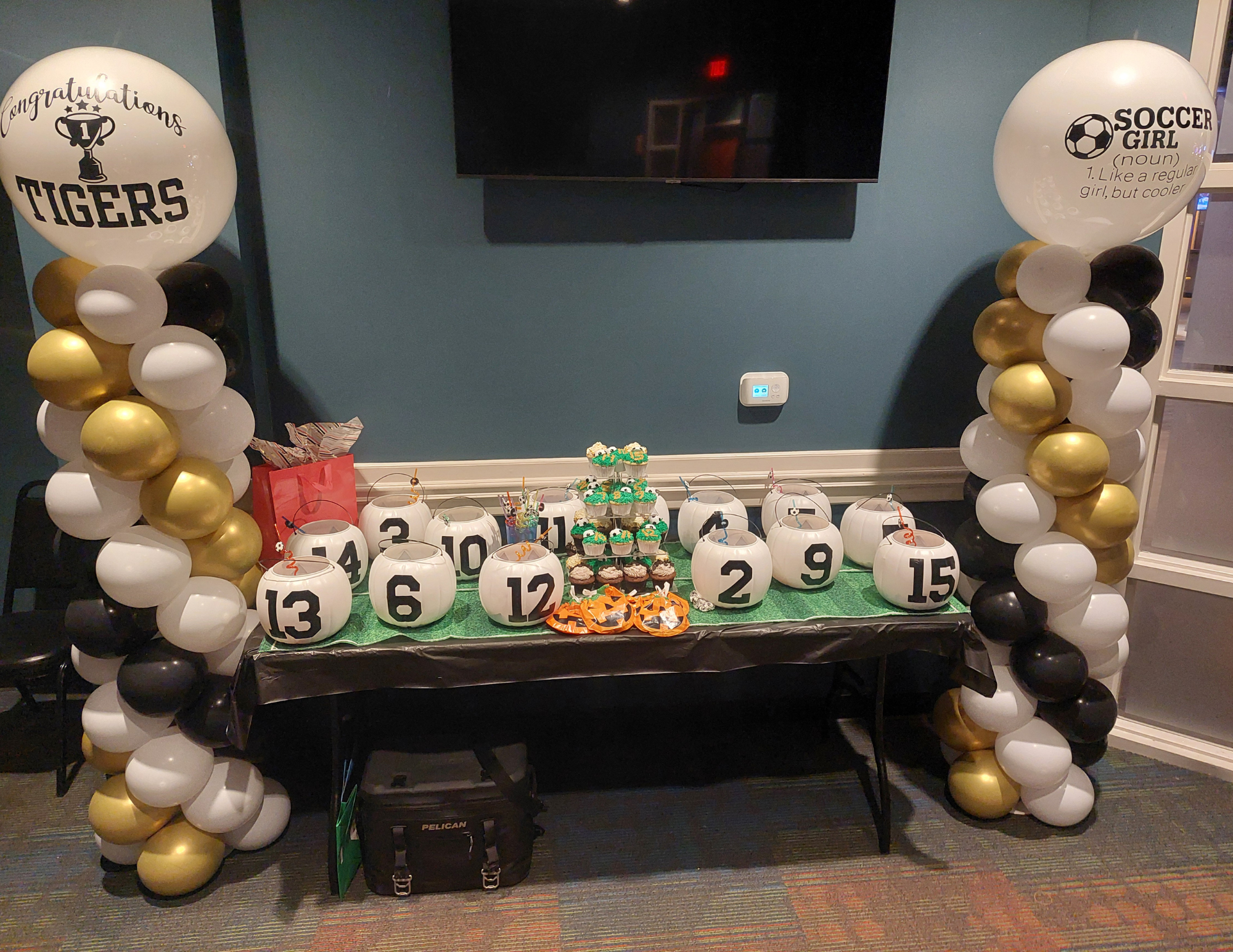 Spiral Balloon Columns with 2-3 foot balloon topper and vinyl signage