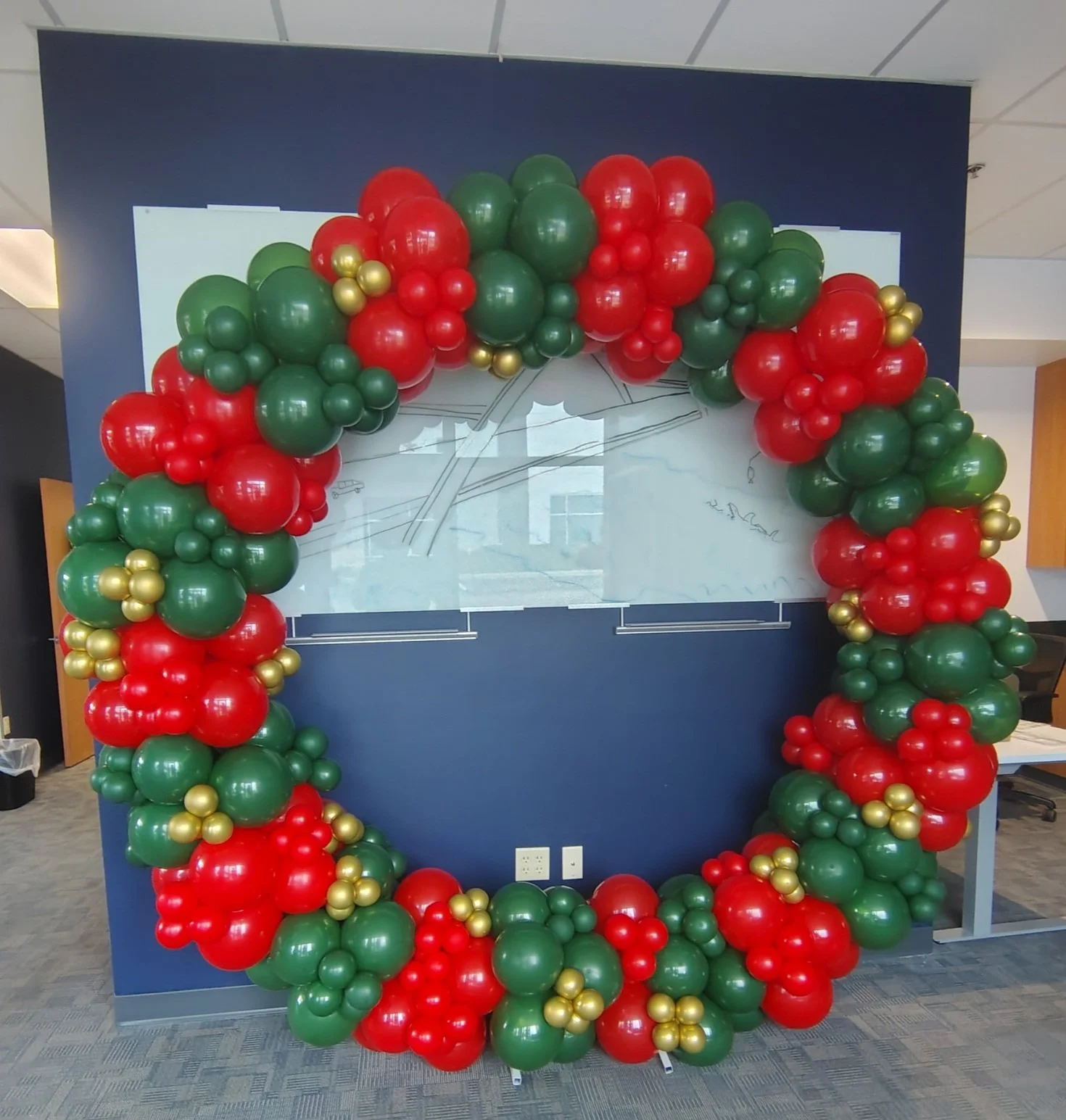 Full circle balloon garland on circle backdrop stand
