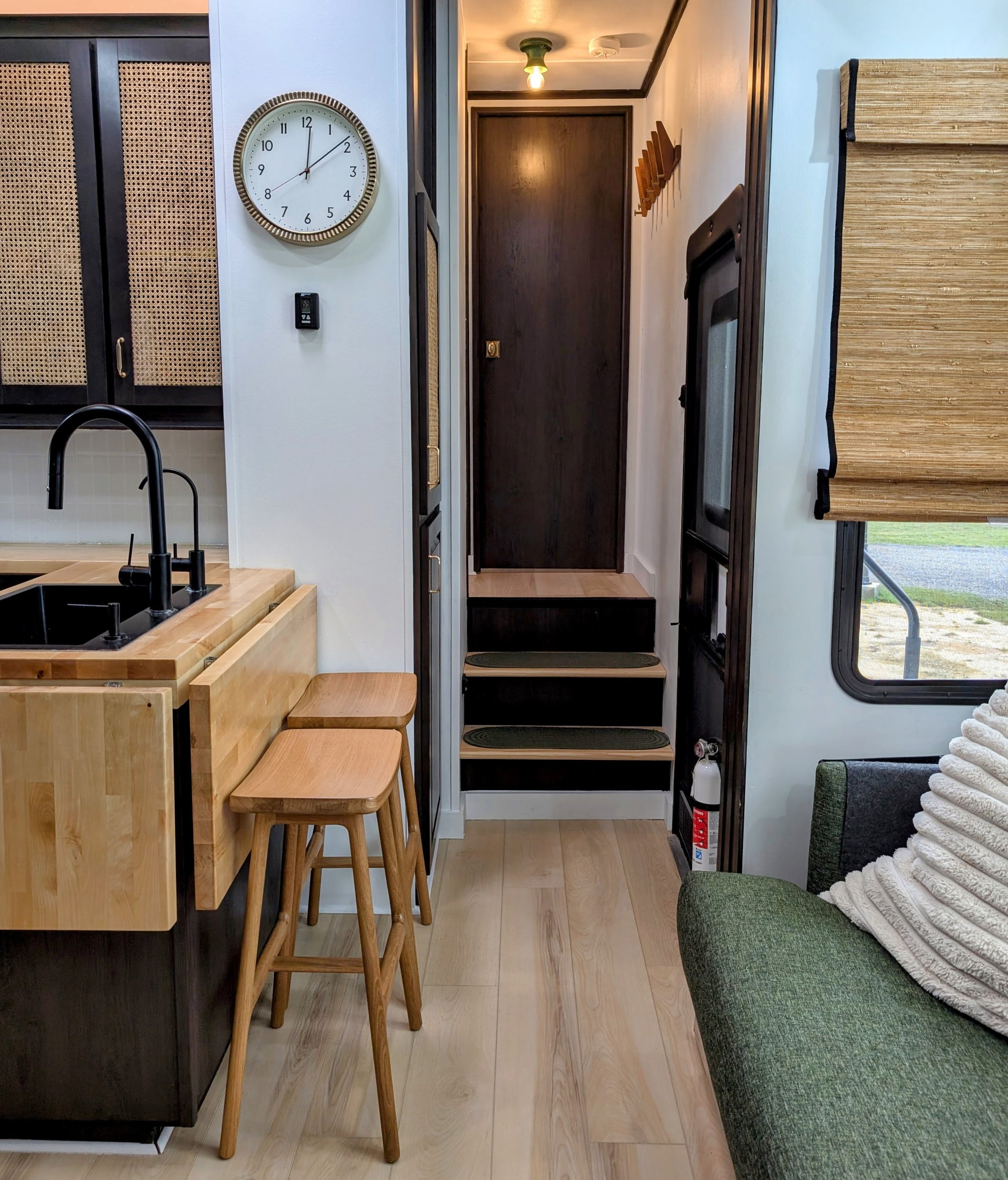Seating area with flip out tables down and hallway