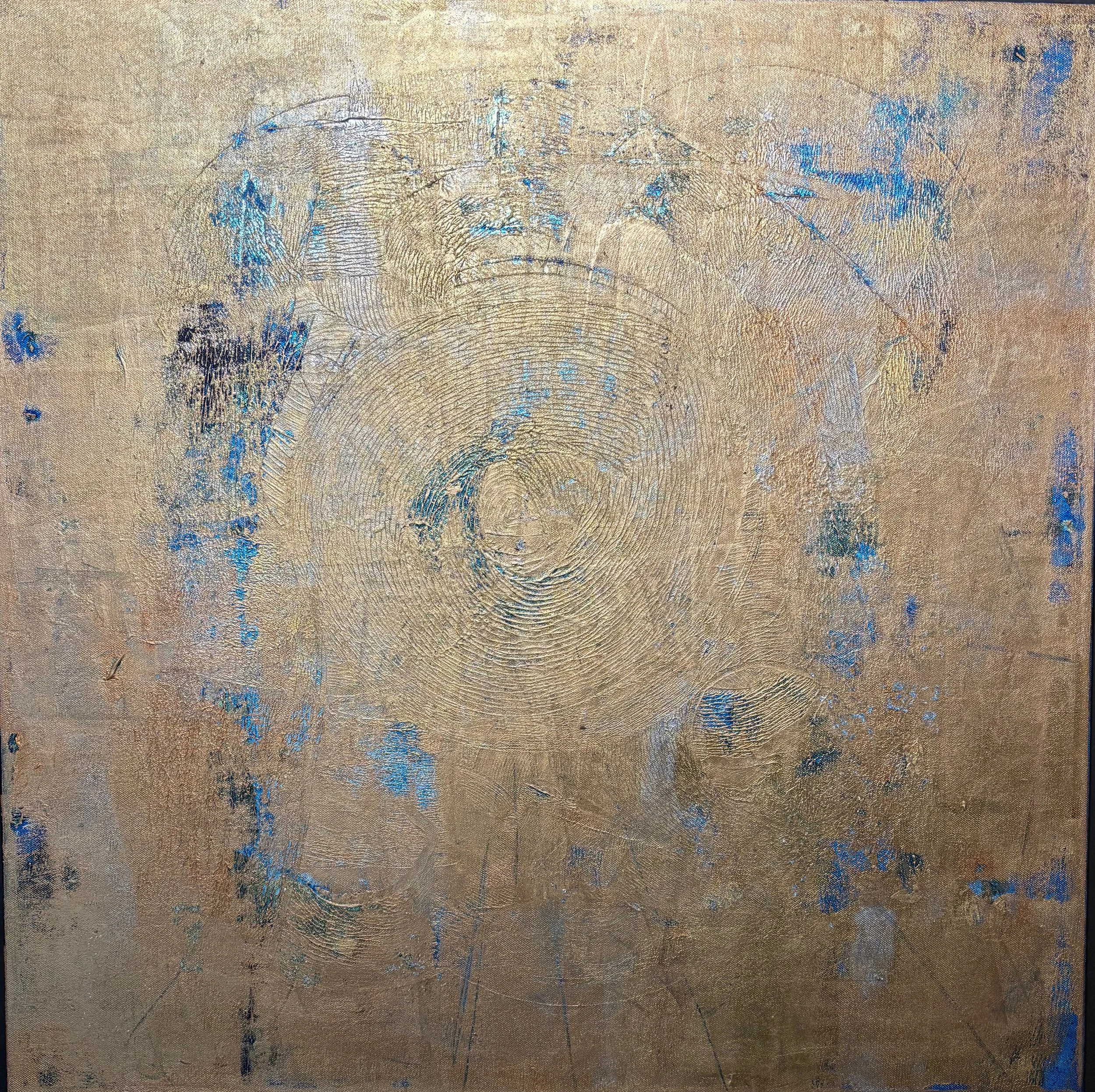 Abstract painting with circular textured patterns in gold and hints of blue