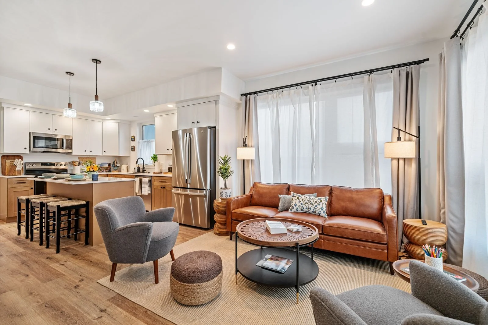 Open living room and kitchen at 849 Accolade Loop, a short term rental managed by BozemanBnB in the Gallatin Valley near Belgrade, Montana