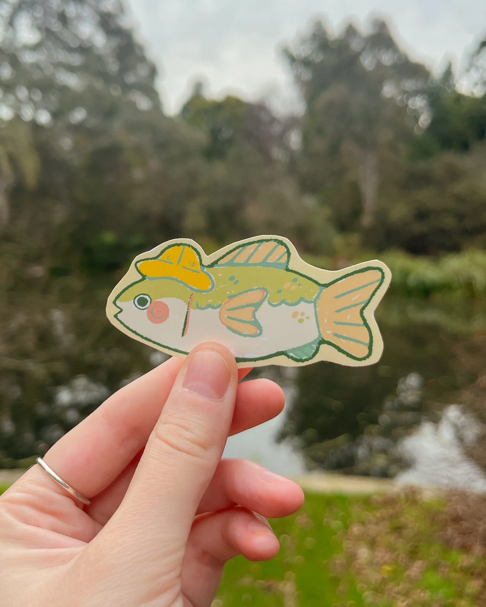 Fish in a hat sticker