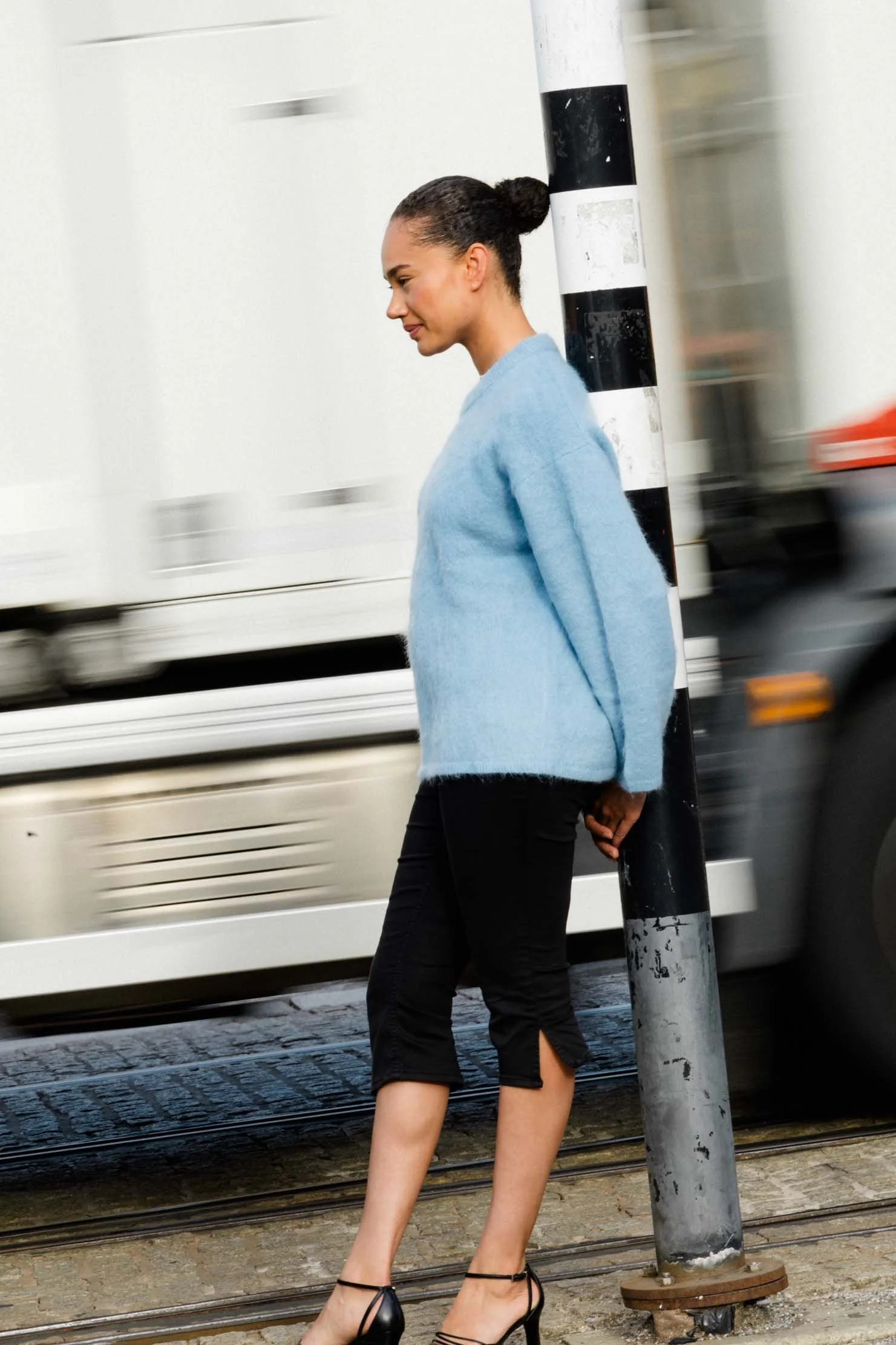 street-style-editorial-blue-knit-sweater-passing-truck.jpg