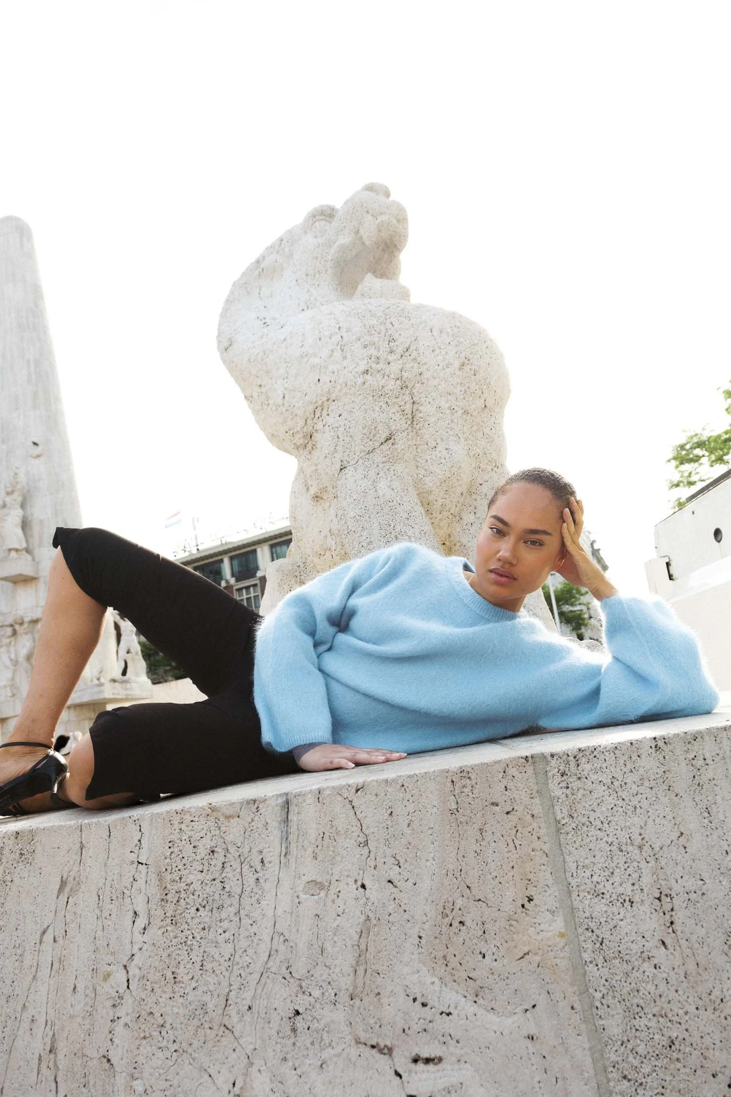 womens-fashion-editorial-blue-knitwear-backlit-portrait.jpg