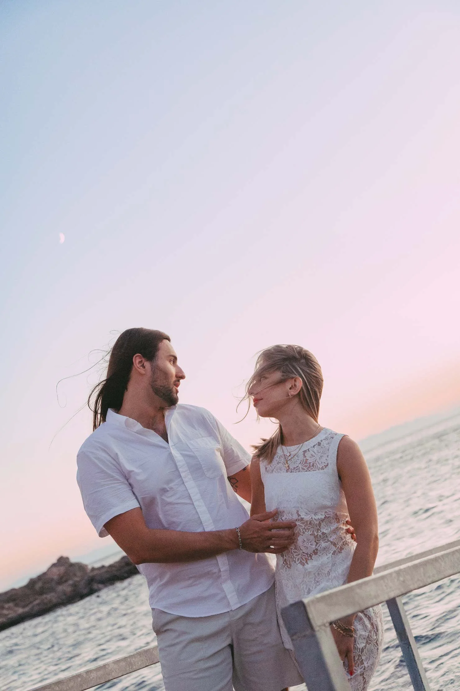 pier-engagement-portrait-pastel-sky-greece.jpg