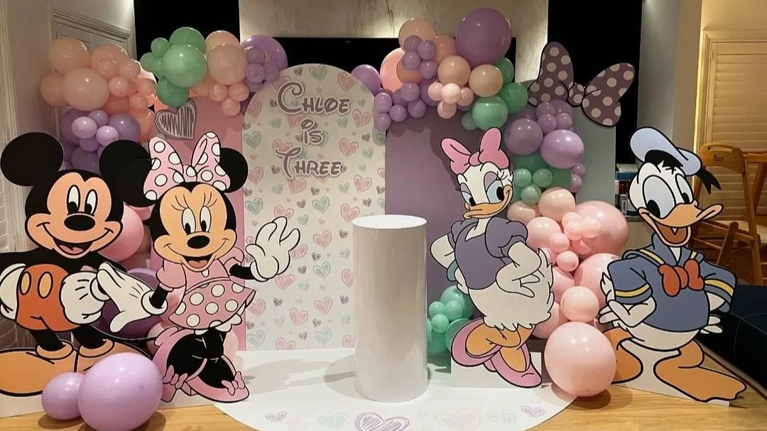 Laurie’s customers, Larissa and Emmett, just married walking off the aisle together.