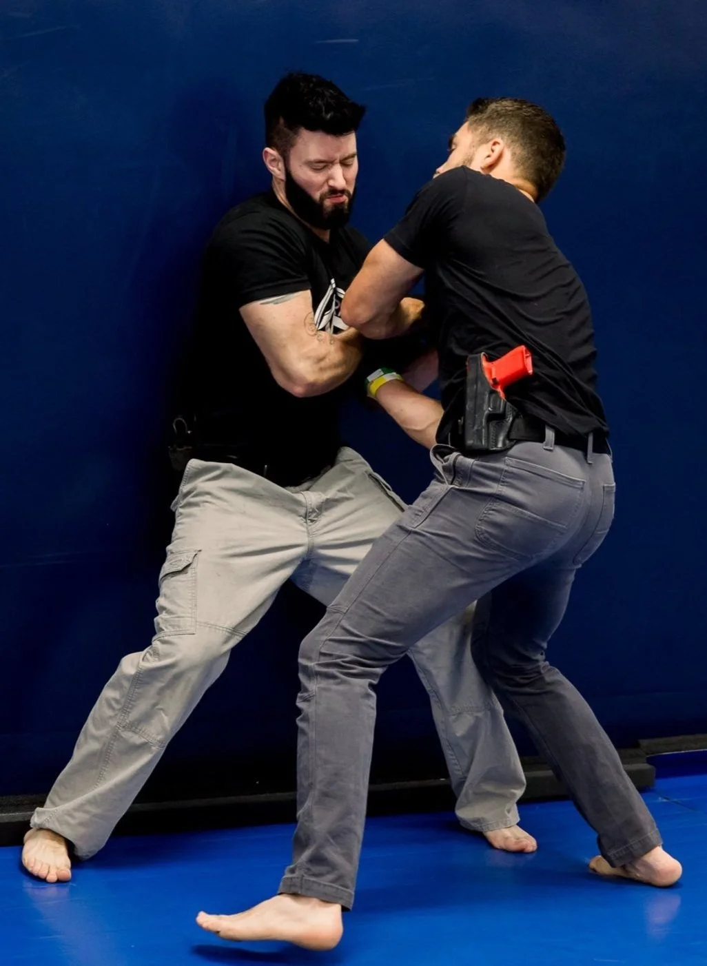 Ground technique being taught on the mats