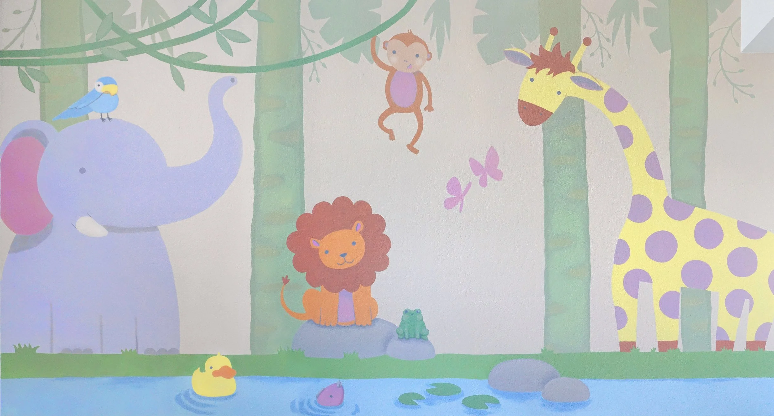Colorful cartoon illustration of animals in a jungle scene, including a blue bird on an elephant's trunk, a monkey hanging from a tree branch, a yellow giraffe with purple spots, a smiling lion sitting on a rock, a frog and a duck swimming in water, 