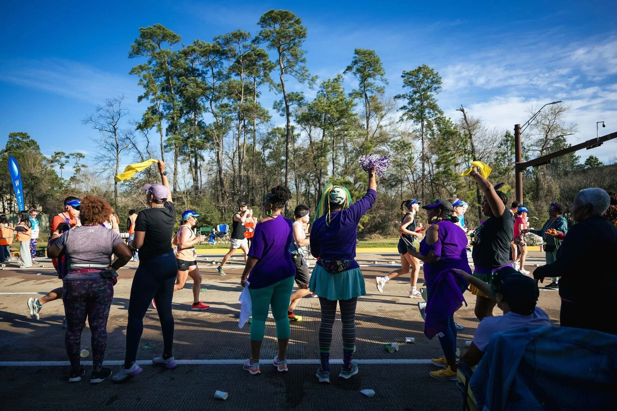 A spirited Cheer Challenge group supporting runners