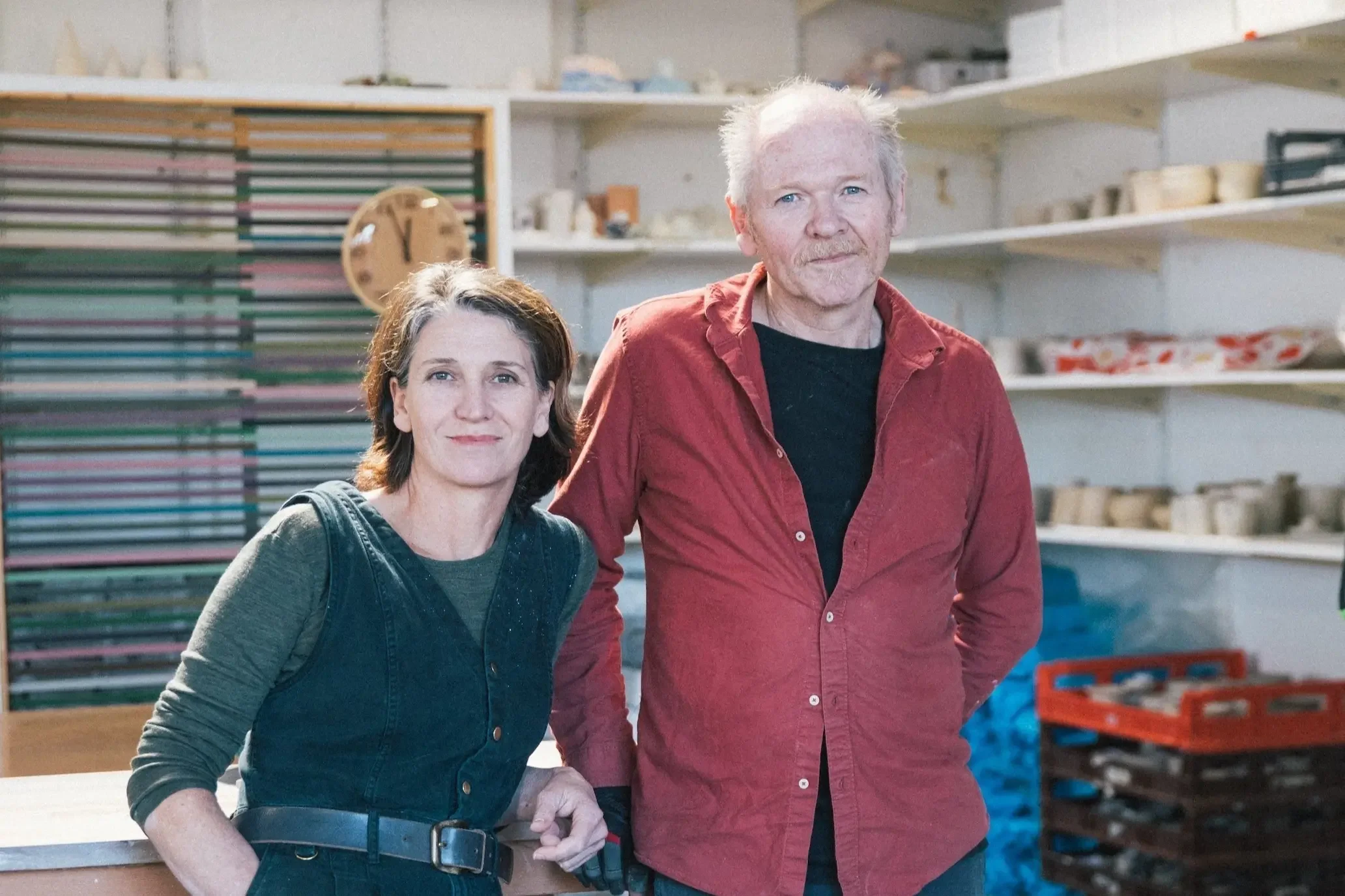 Sally and Michael, who run Mayfield Studios, with their dog Scruffy in the Abbotsford studio