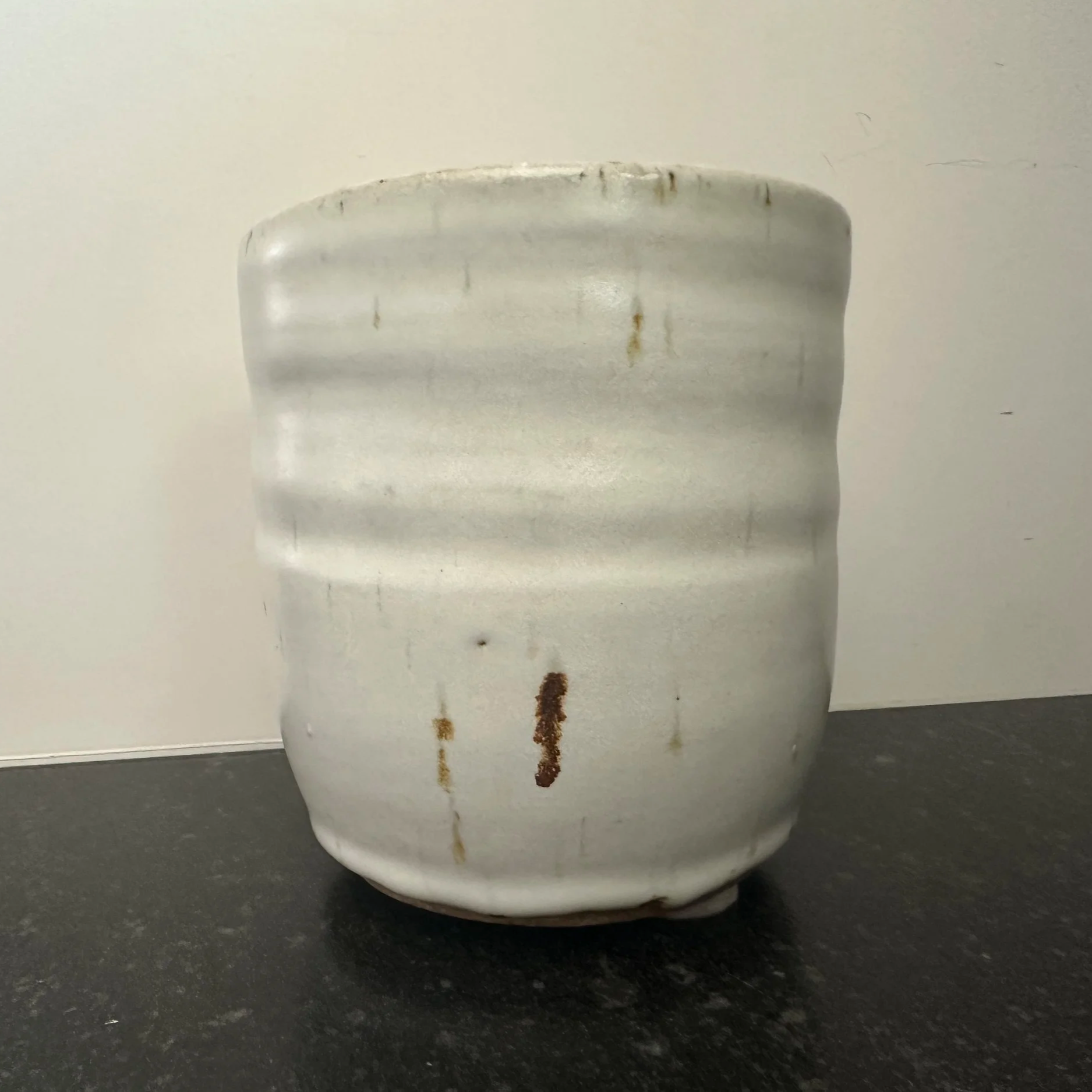 Speckled white cylinder 