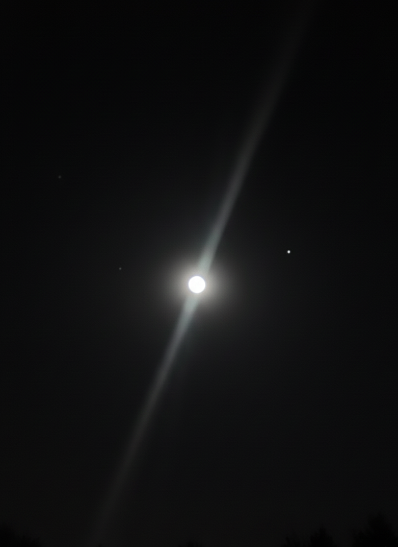 The moon with Jupiter in view.