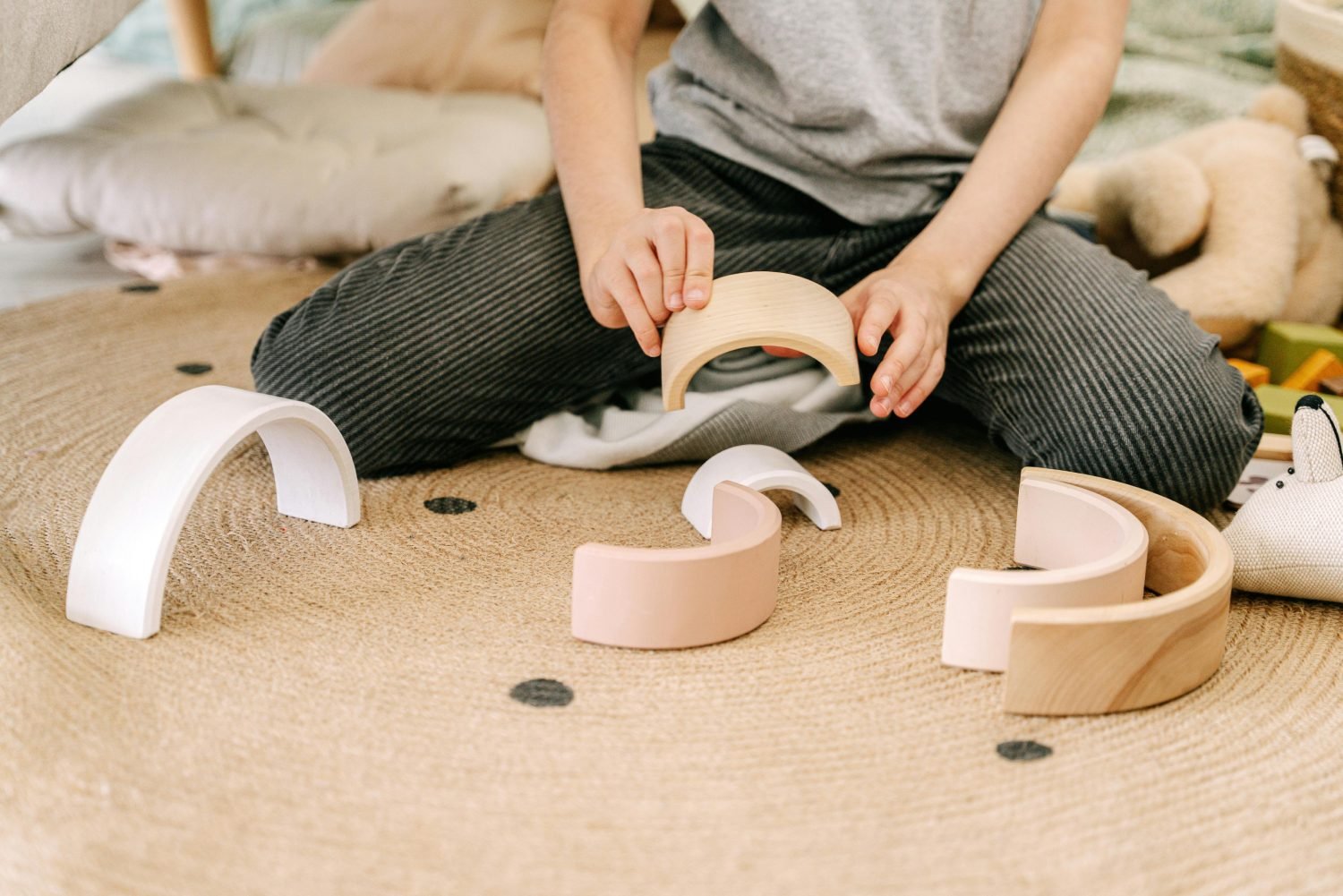 Child playing with sensory toys