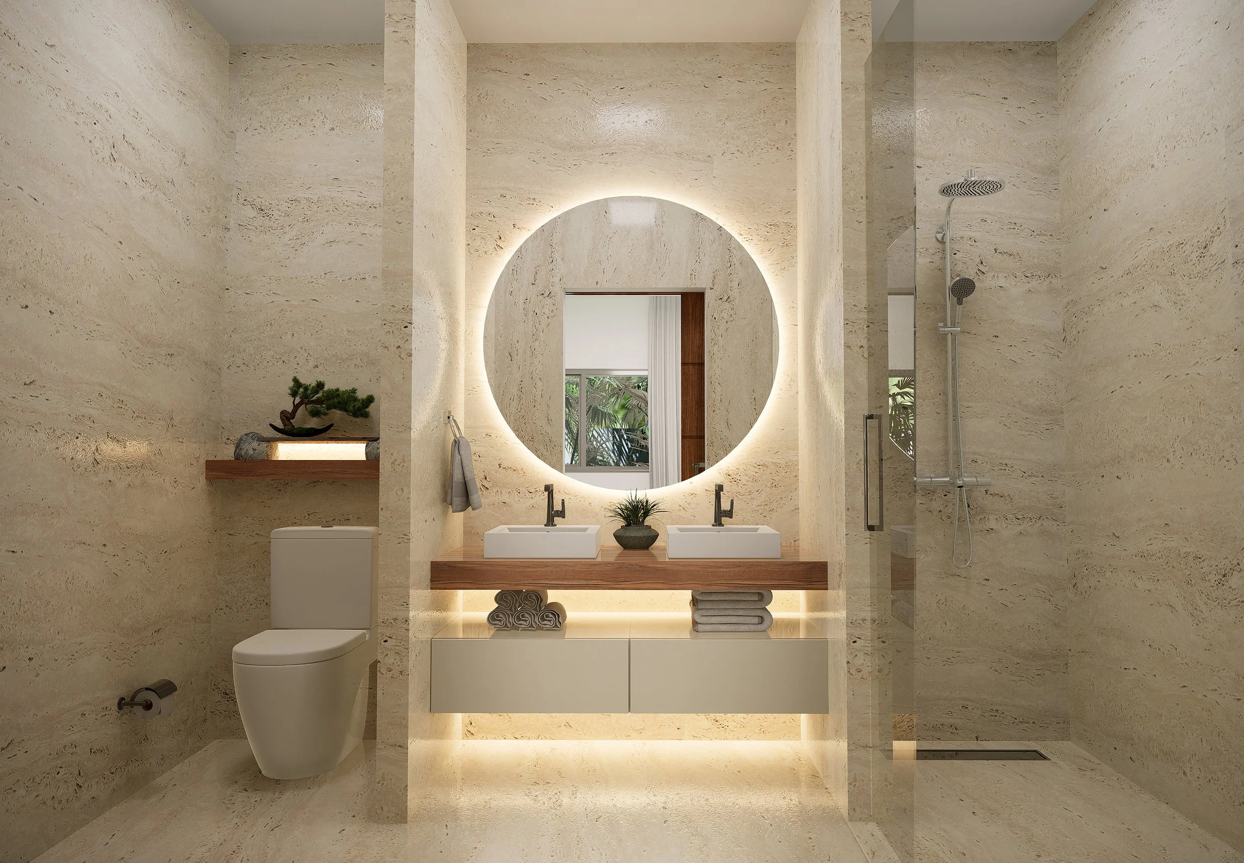 Moderno cuarto de baño con paredes de mármol beige, espejo circular iluminado, lavabo doble, inodoro, ducha de cristal y estante con planta decorativa.