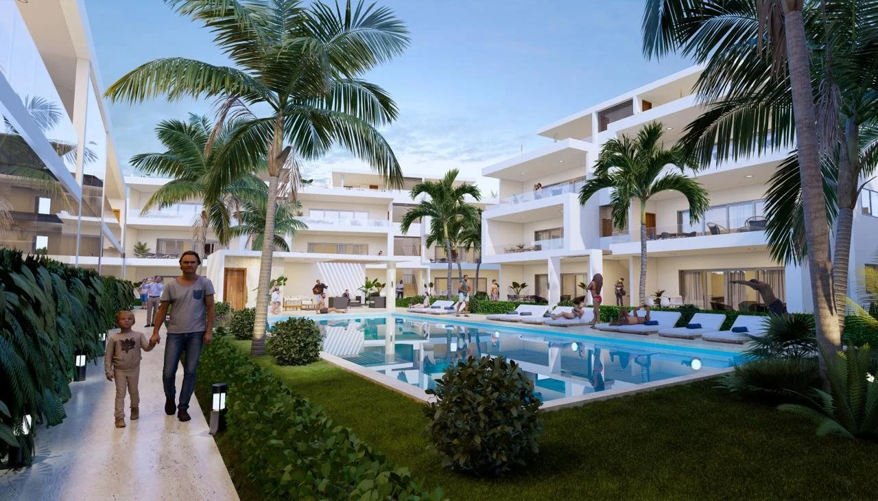 Complejo residencial moderno con piscina, palmeras y jardín. Personas caminando y relajándose.