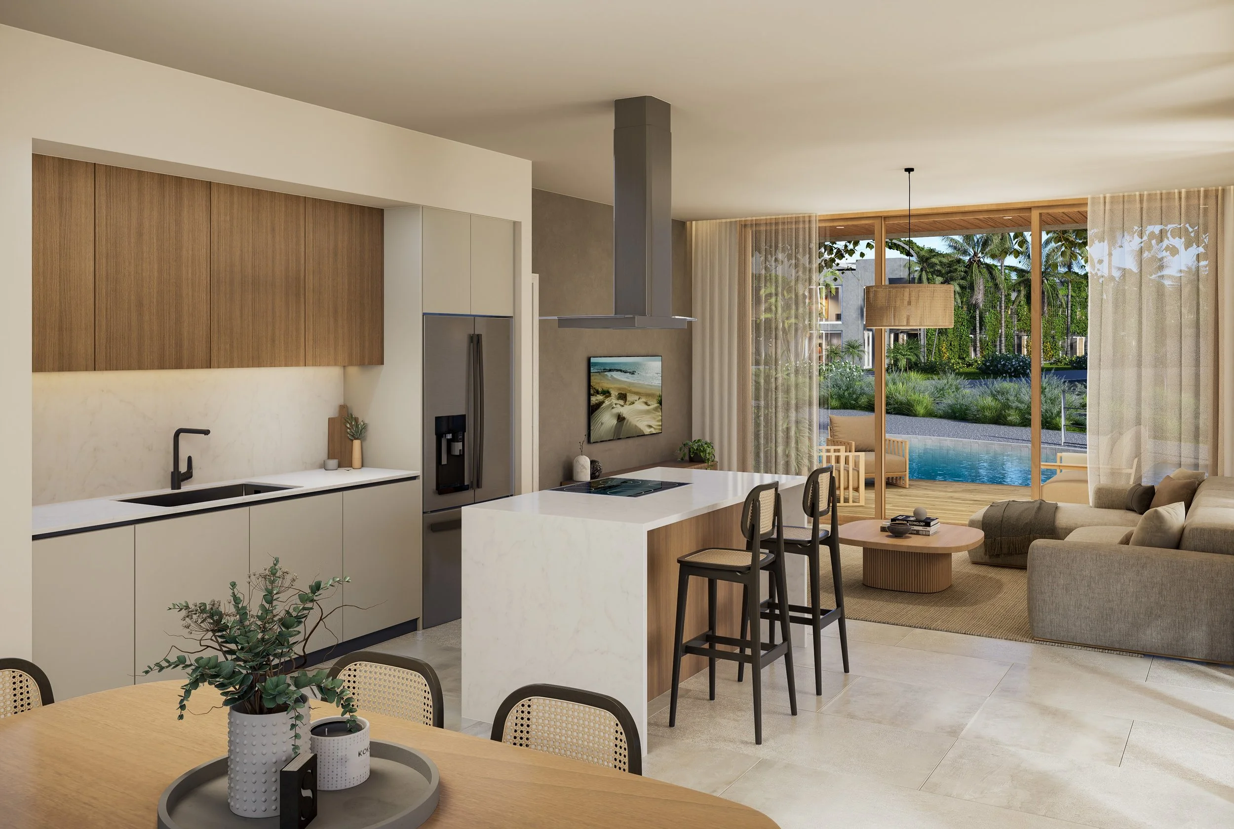 Cocina moderna de diseño abierto con isla central, electrodomésticos de acero inoxidable, y vista a una sala de estar con sofá y mesa de centro. Ventanas grandes muestran un jardín con piscina y plantas tropicales.