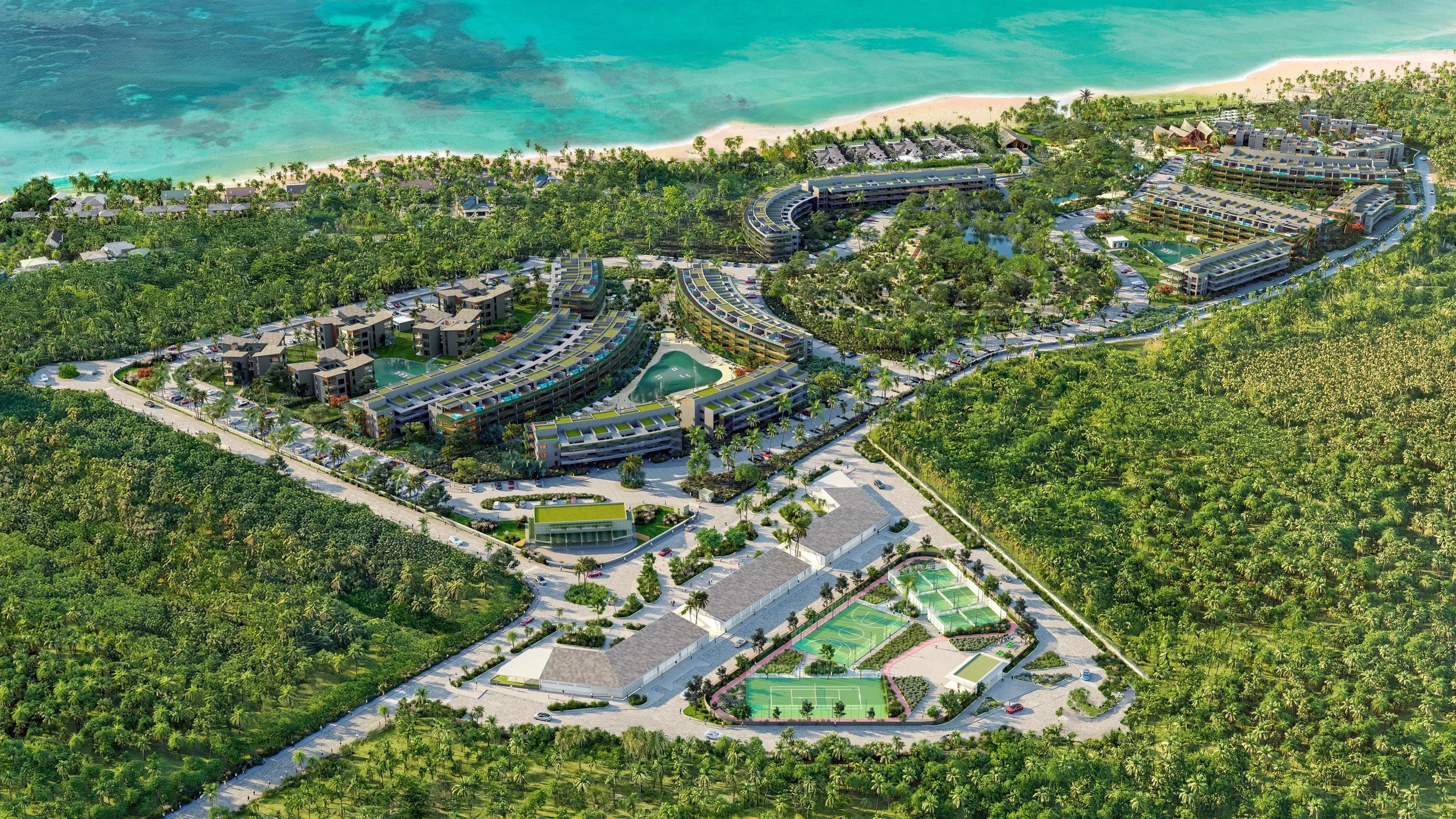Complejo turístico con edificios residenciales, piscinas, canchas deportivas, rodeado de vegetación tropical y cerca de la playa con agua turquesa.