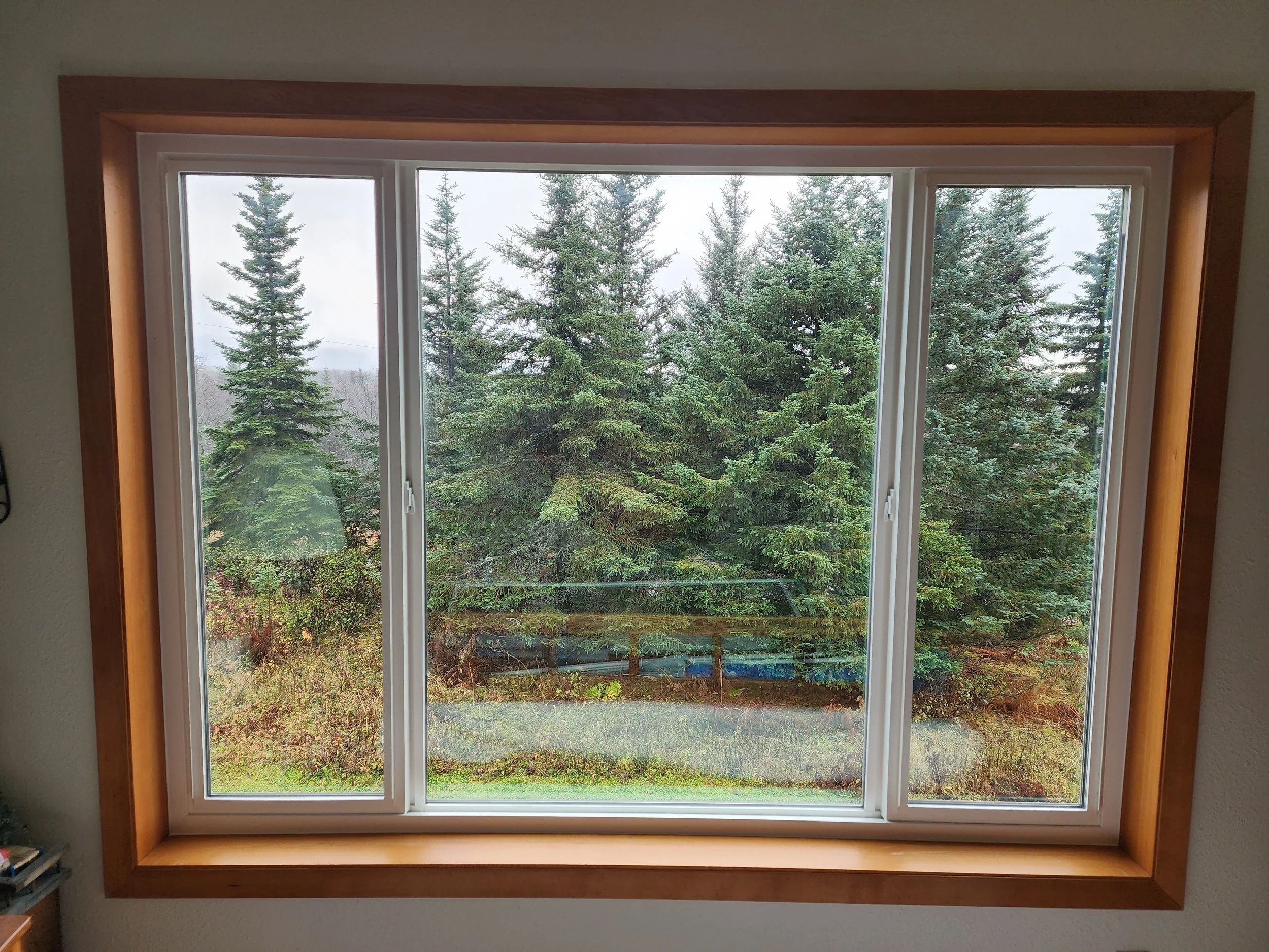 Stained trim vinyl window.jpg