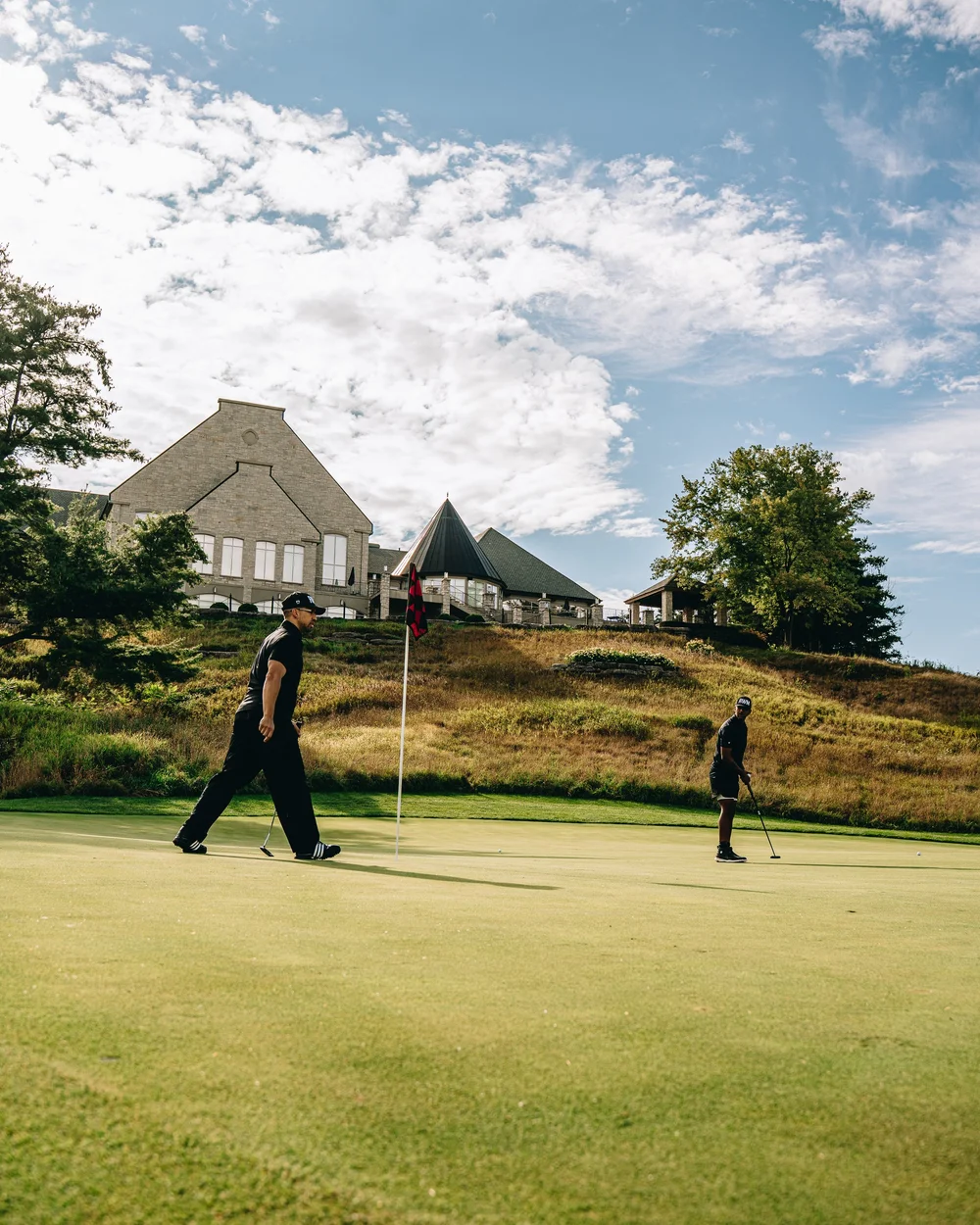The Copper Creek clubhouse above the green