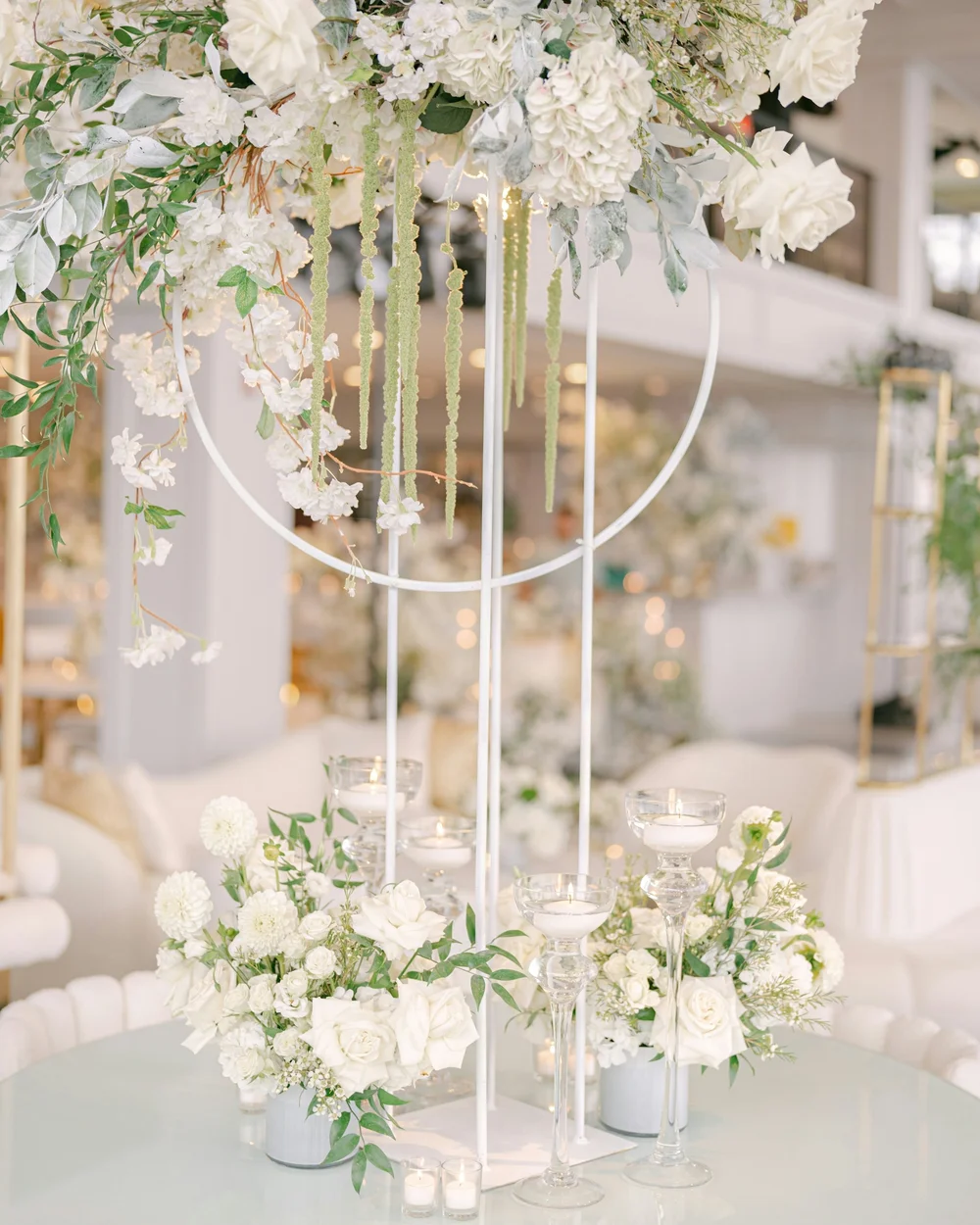White florals and candles at a BBA wedding