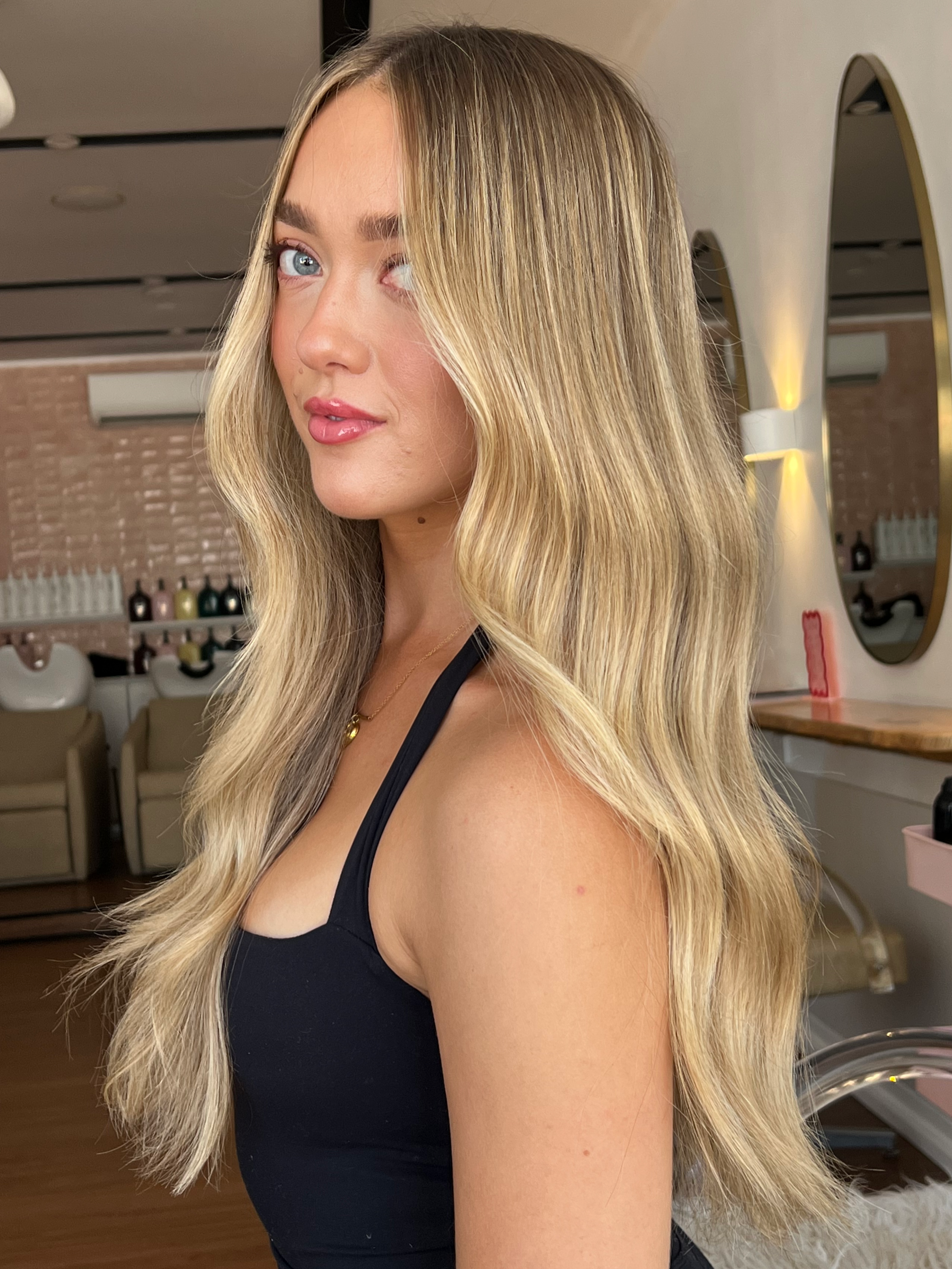 Soft, dimensional blonde with subtle lowlights and refined highlights. Glossy finish in natural light. Alt text: Old money blonde hair colour at HairyAdelaide, Mona Vale, Northern Beaches