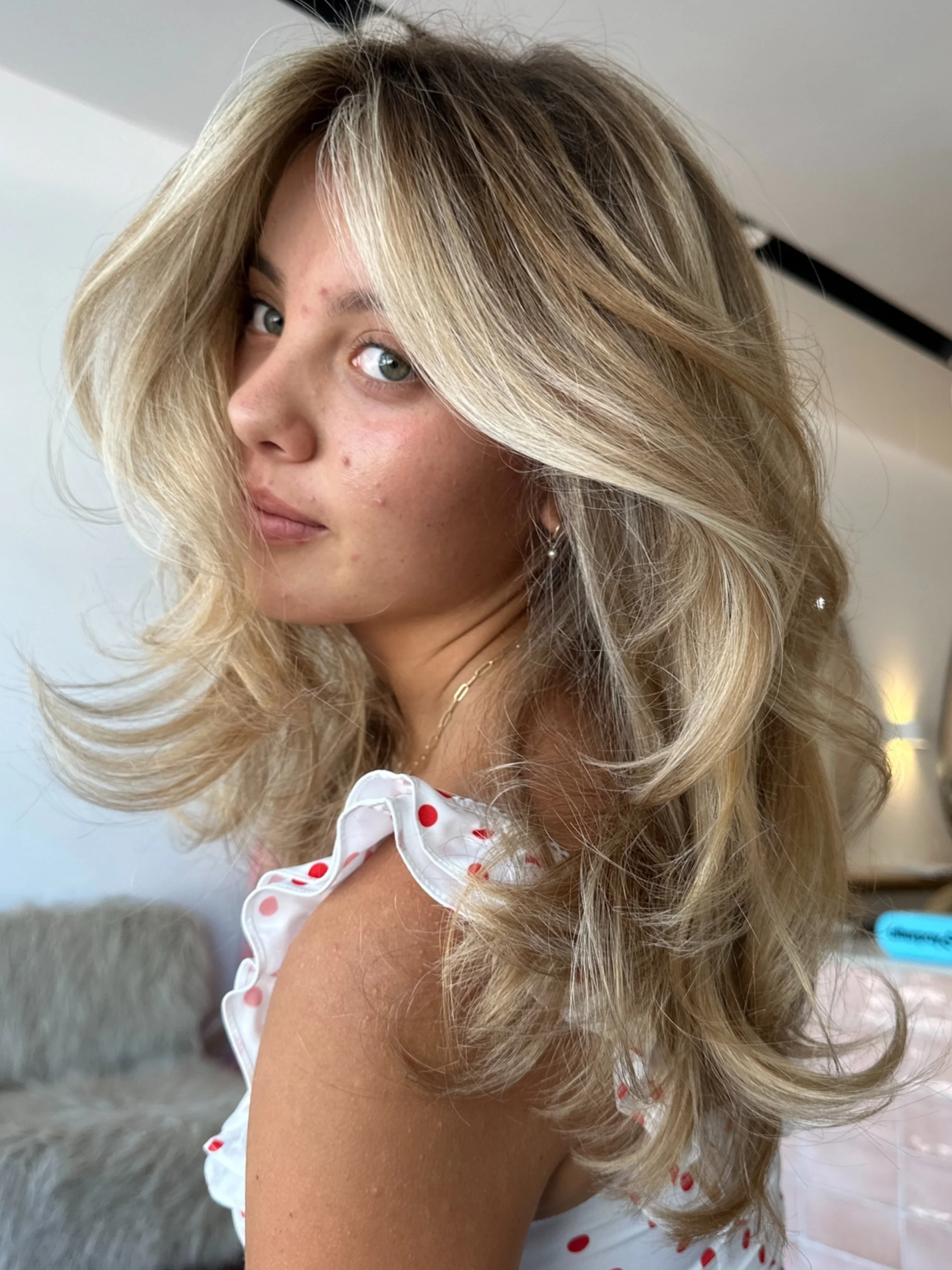 Root touch-up maintaining a bright blonde result. Clean, even lift at the regrowth. Natural light, face-level angle. Alt text: Blonde maintenance root touch-up at HairyAdelaide, Mona Vale, Northern Beaches