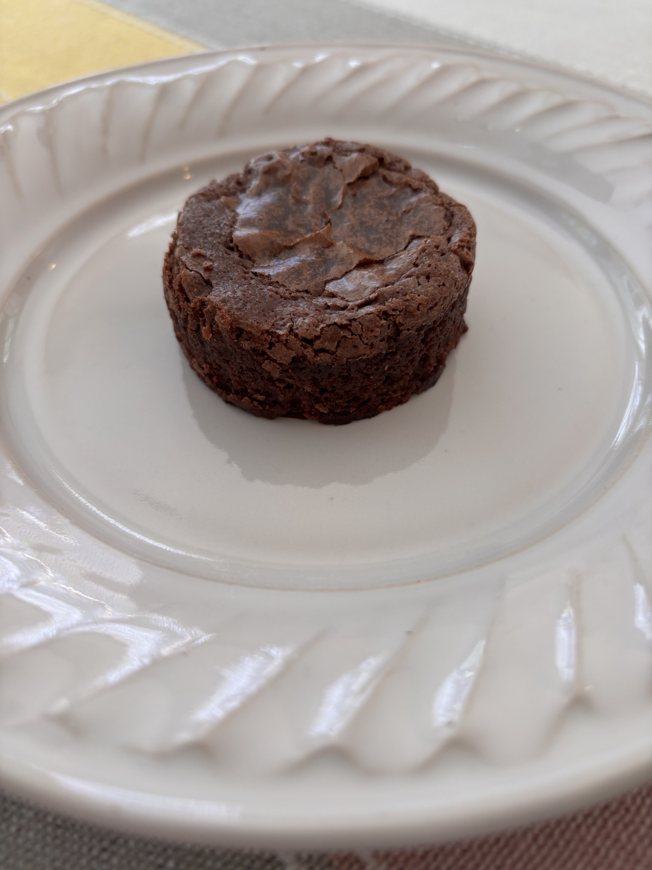 Round brownie on plate