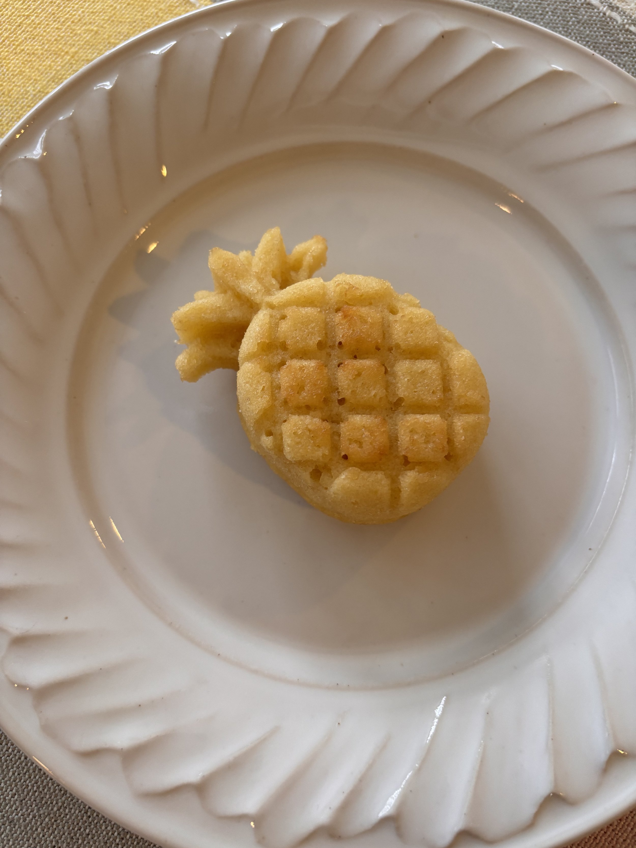 Close-up of mini pineapple-shaped tropical rum cake