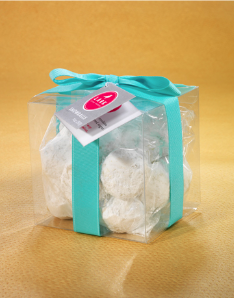 Traditional Russian tea cakes coated in powdered sugar, featuring a rich buttery texture and nutty flavor, perfect for holiday gifts, dessert trays, and special occasions.