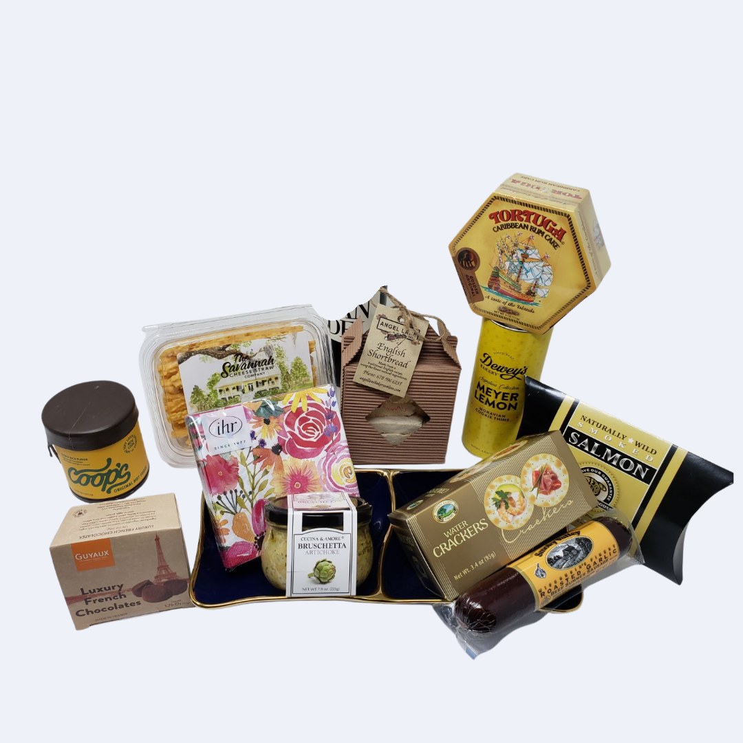 Gourmet appetizer gift basket with crackers, smoked salmon, spreads, chocolates, lemon cookies, and assorted snacks