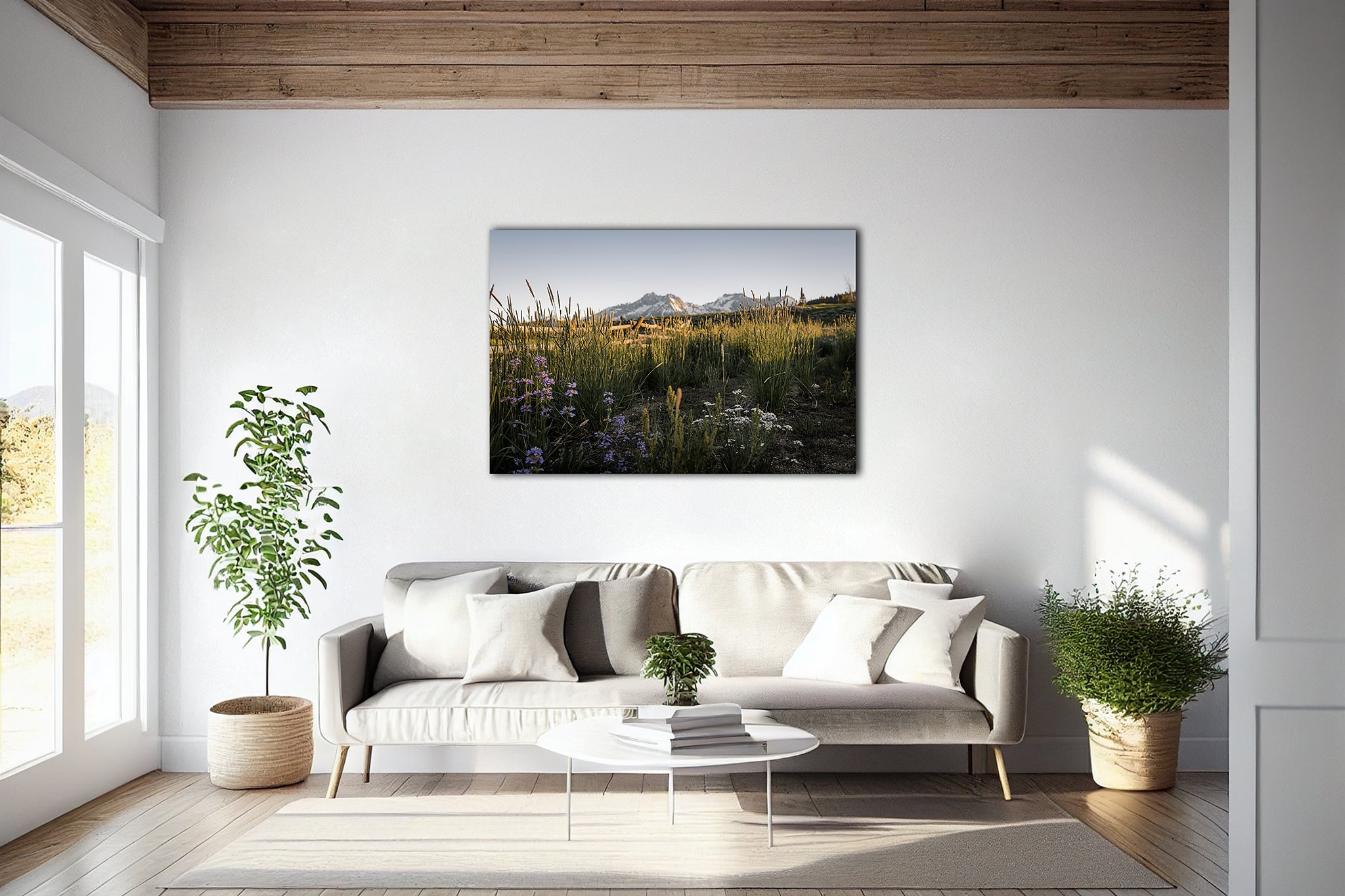 Idaho landscape wall art featuring the Sawtooth Mountains displayed in a bright office waiting room interior.