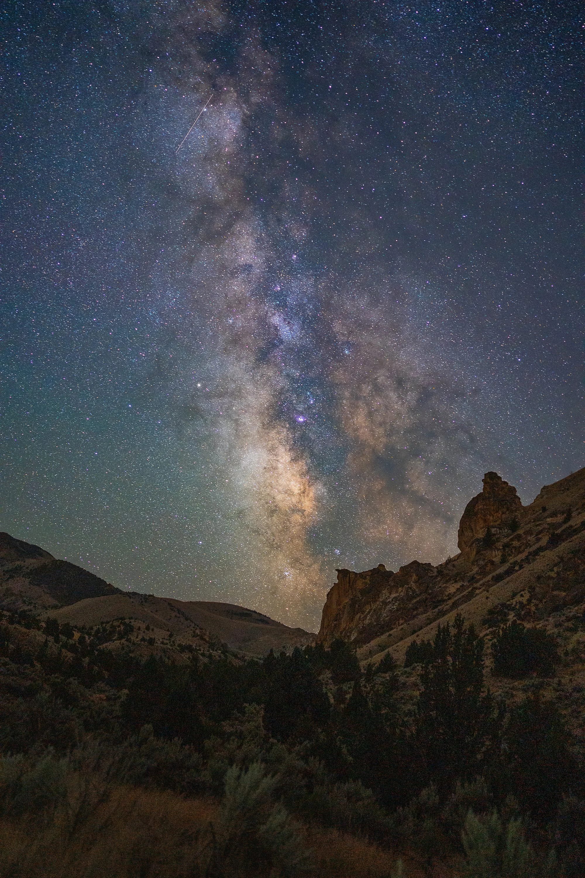 Milky Way over Leslie Gulch rock formations in the Owyhees of eastern Oregon — astrophotography by Kim Starkey