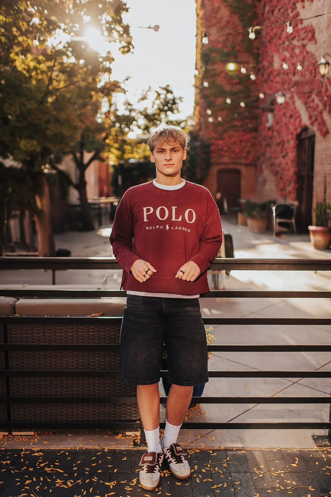 High school senior standing confidently during a relaxed North End senior photo session in Boise, Idaho.