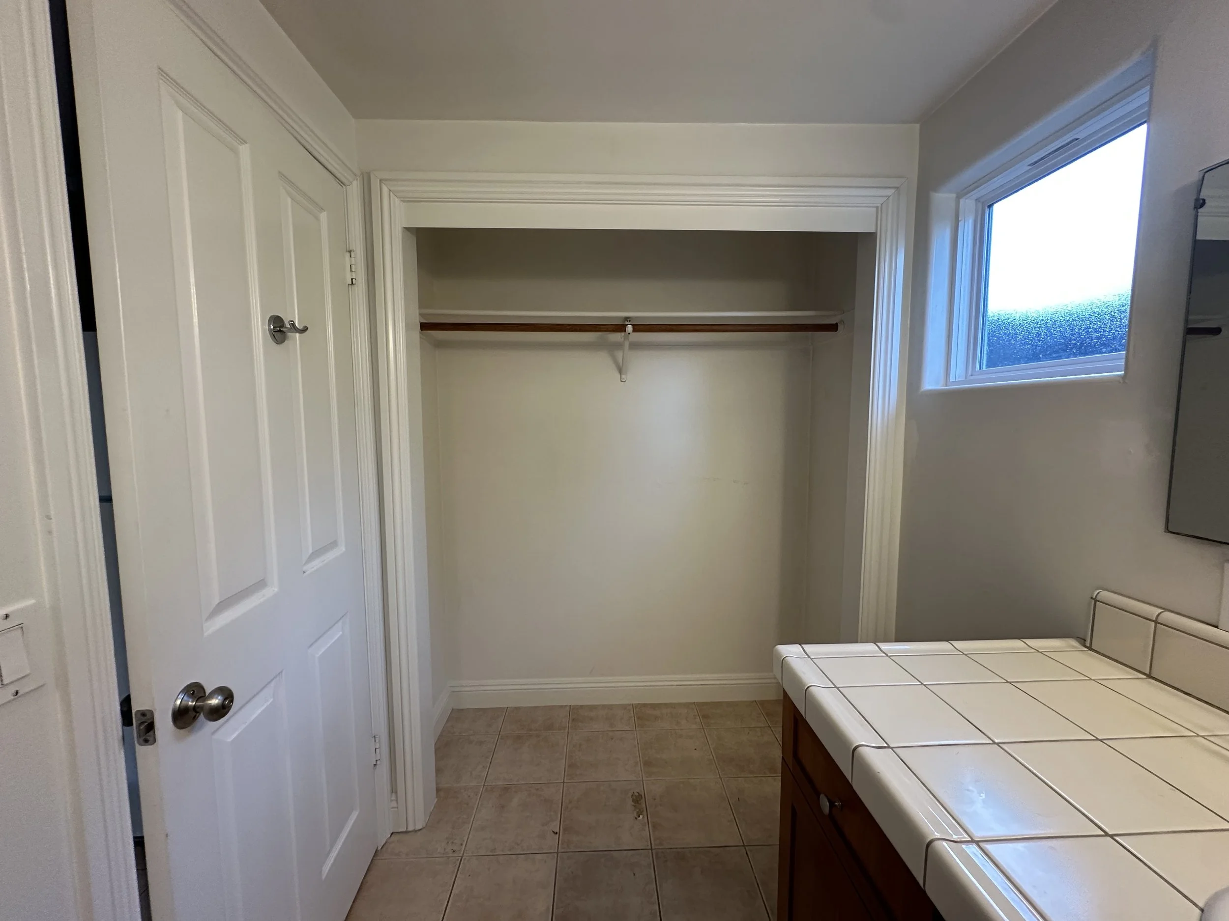 The same closet, cleared out!