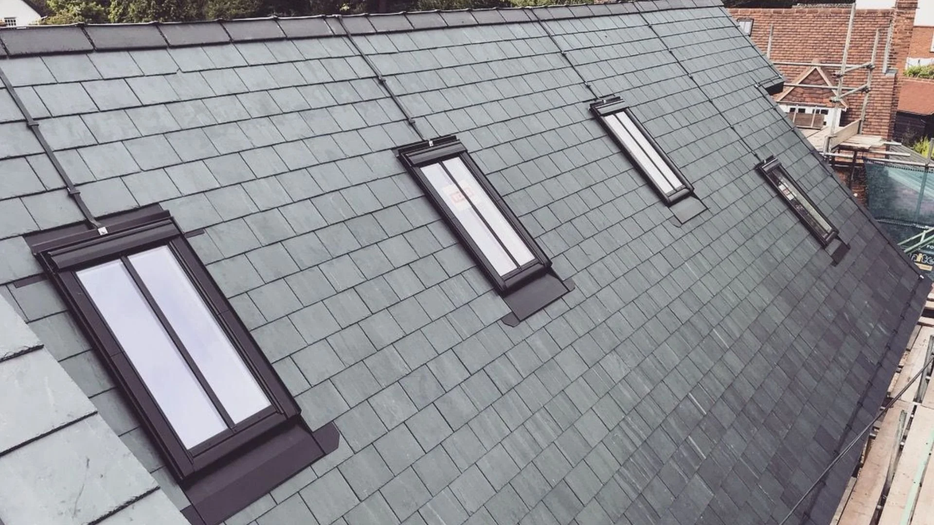 Slate roof with four skylights