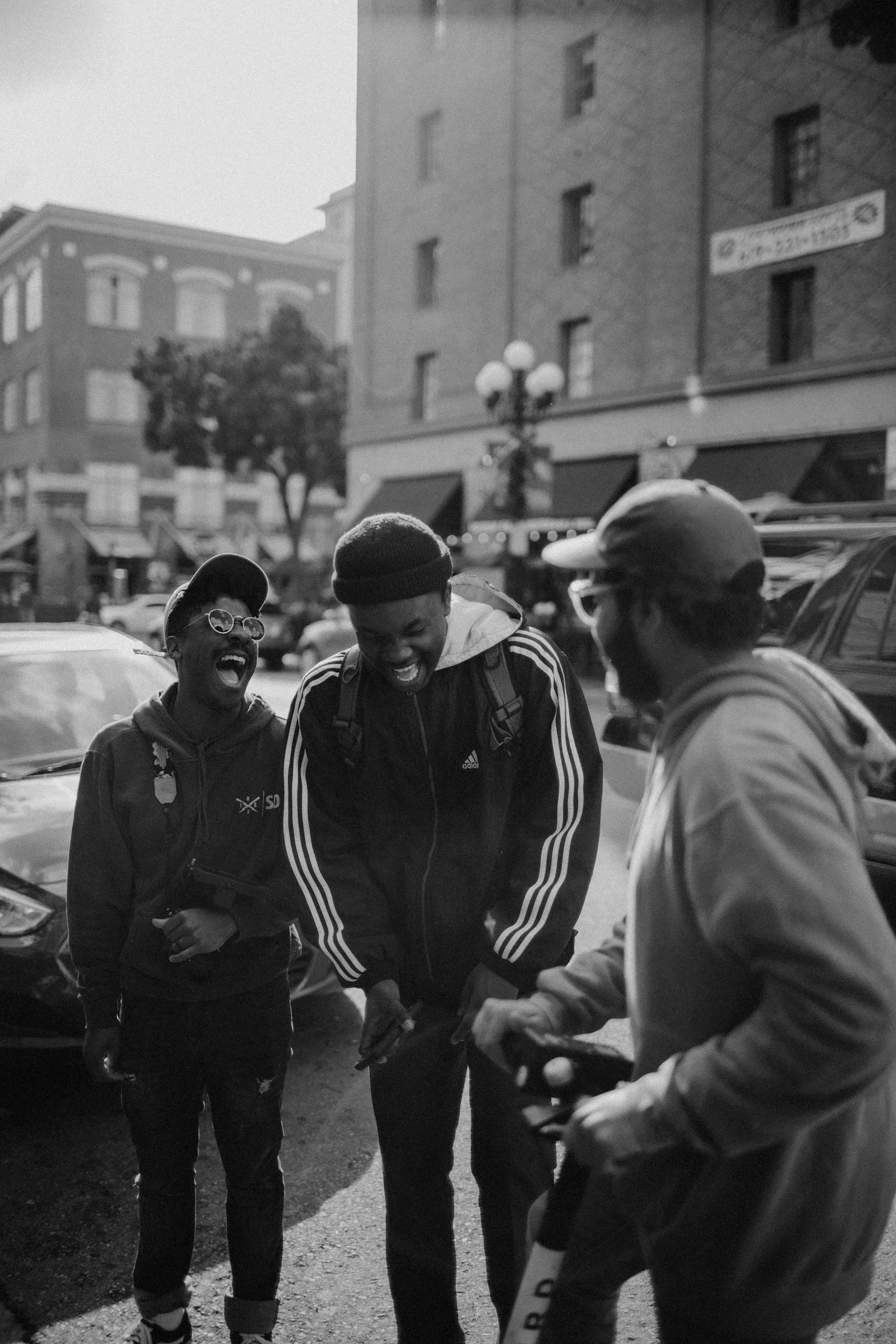 A stock image of three men laughing together