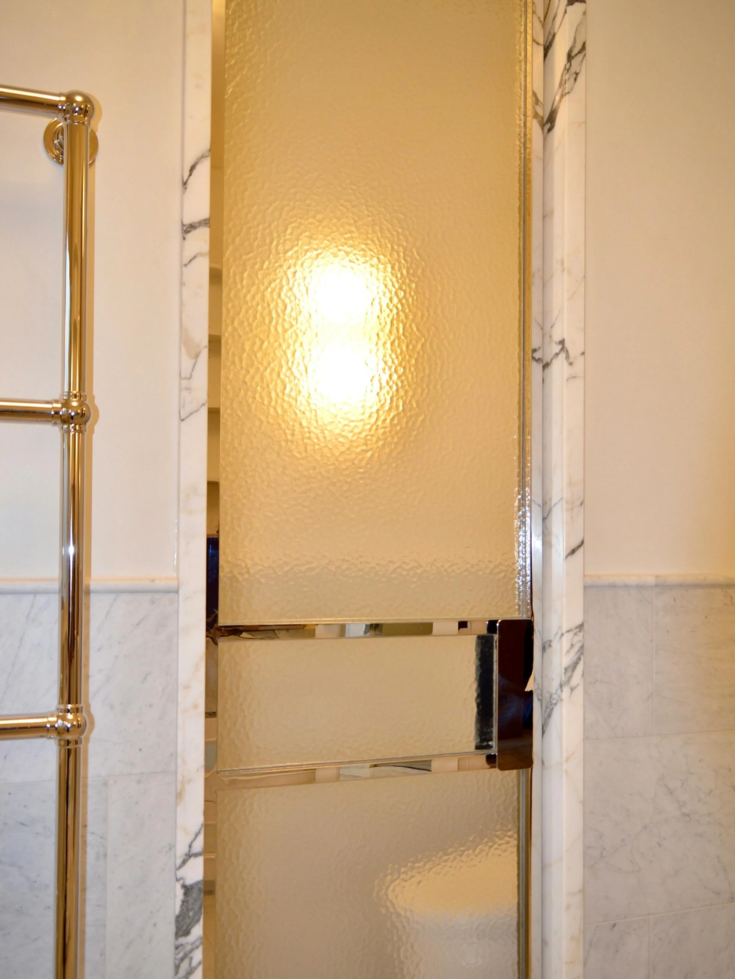 Not your average shower Door.

Mirror Finish Stainless Steel Shower Pivot Doors paired with Cathedral Glass 

#steeldoors #interiordesign #pivotdoor