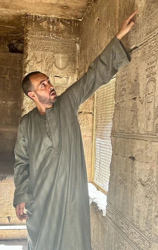 Hakim Awyan conducting a temple visit in Egypt