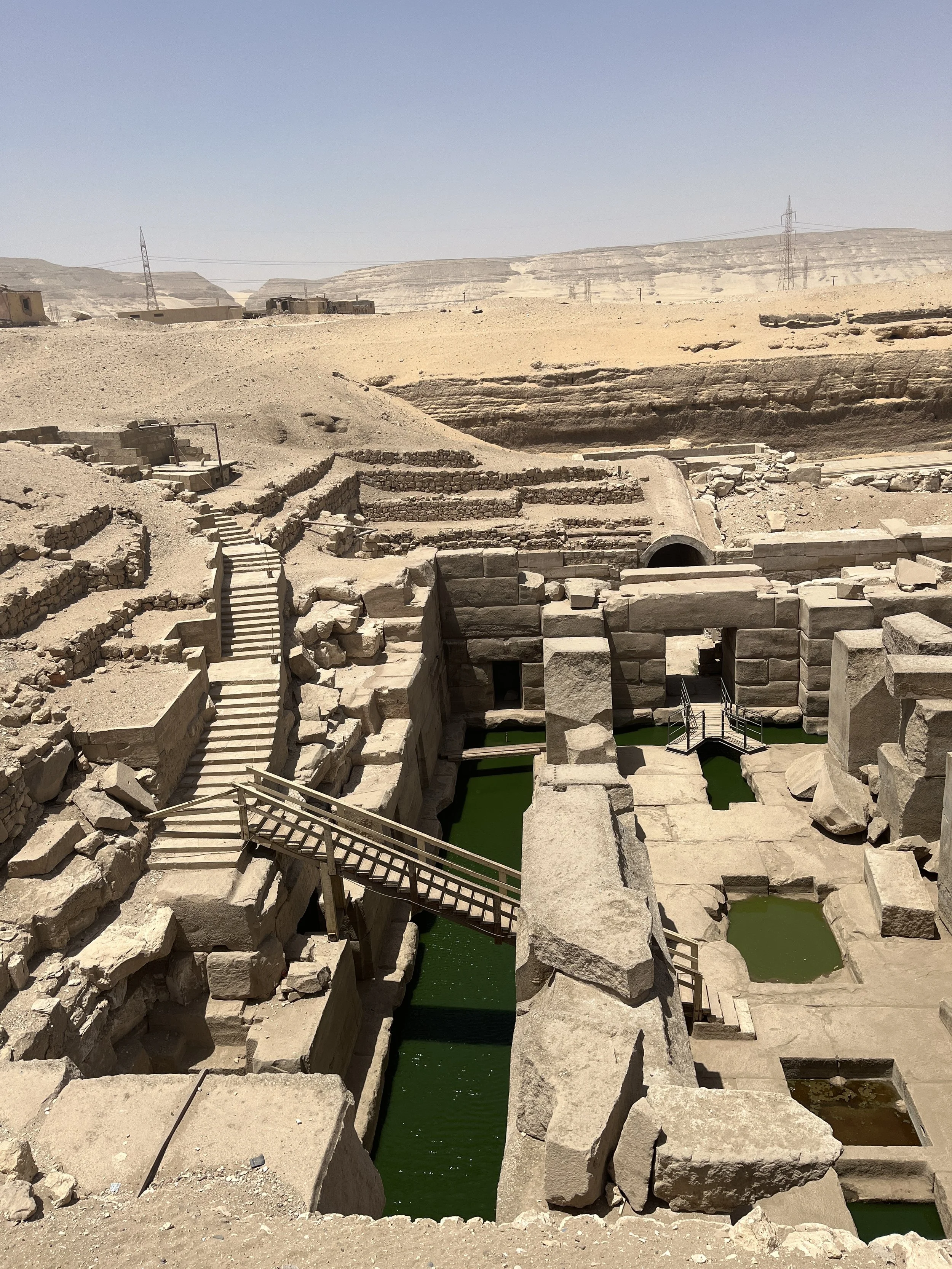 Aerial view of the Osireion at Abydos Egypt — ancient megalithic structure partially submerged in water, considered an Abydos stargate