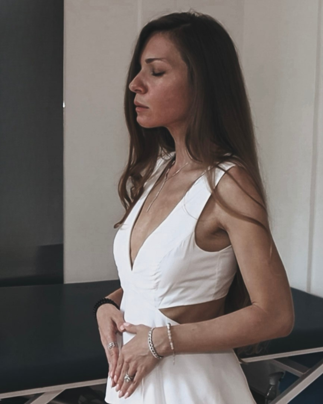 Sabina offering hands-on energy transmission during an Isis–Magdalene Codes Activation session — womb healing and sacred feminine ceremony