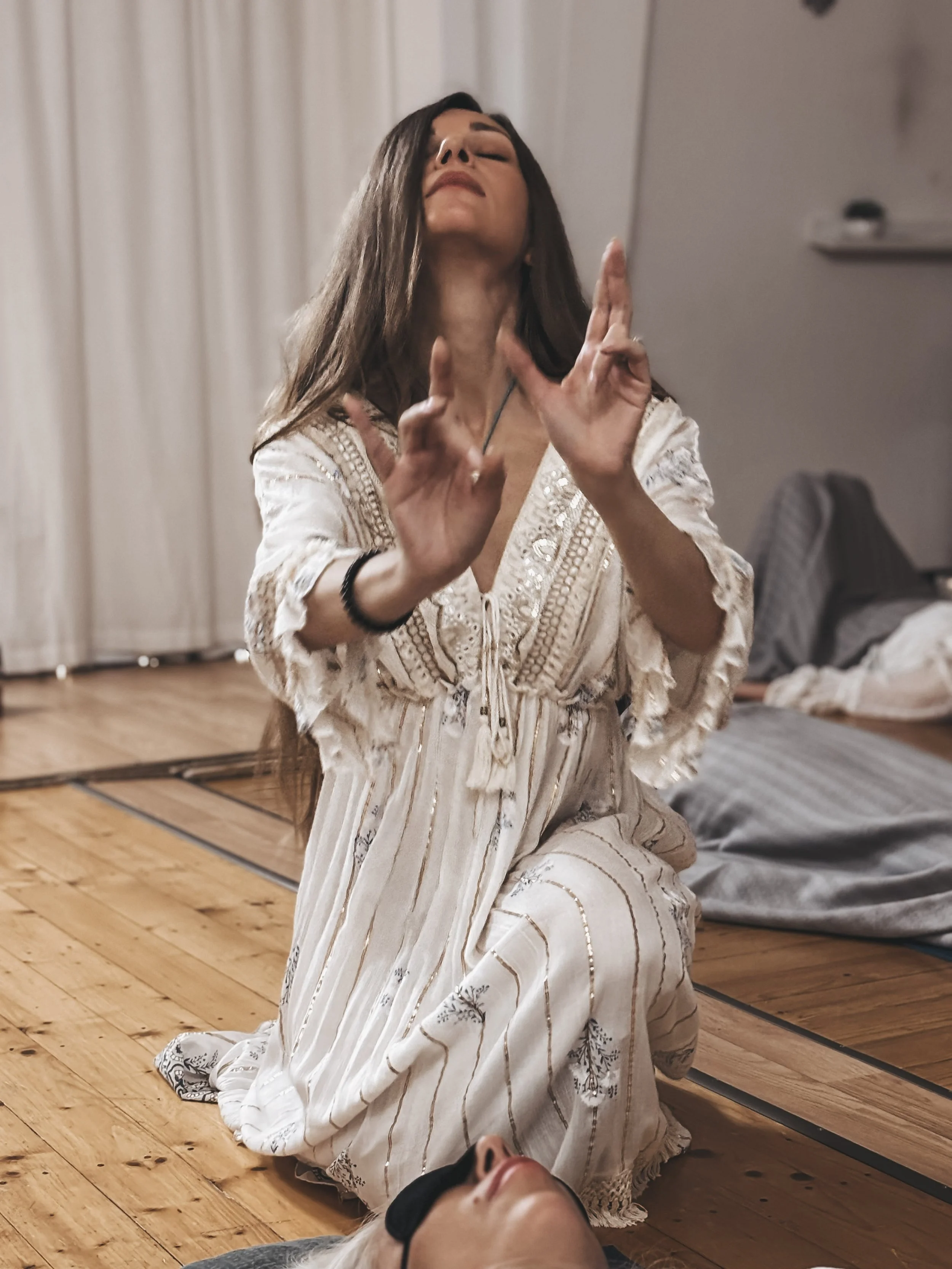 Sabina in sacred presence during an Isis–Magdalene Codes Activation ceremony — divine feminine remembrance and womb healing