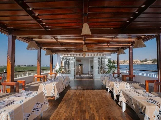 Deck view with diner tables on the dahabiya boat