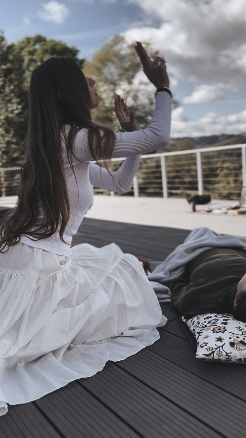 Sabina transmitting light codes through sacred hand movement during a Magdalene Codes Activation — a feminine energy transmission guided by the Rose lineage and divine remembrance.