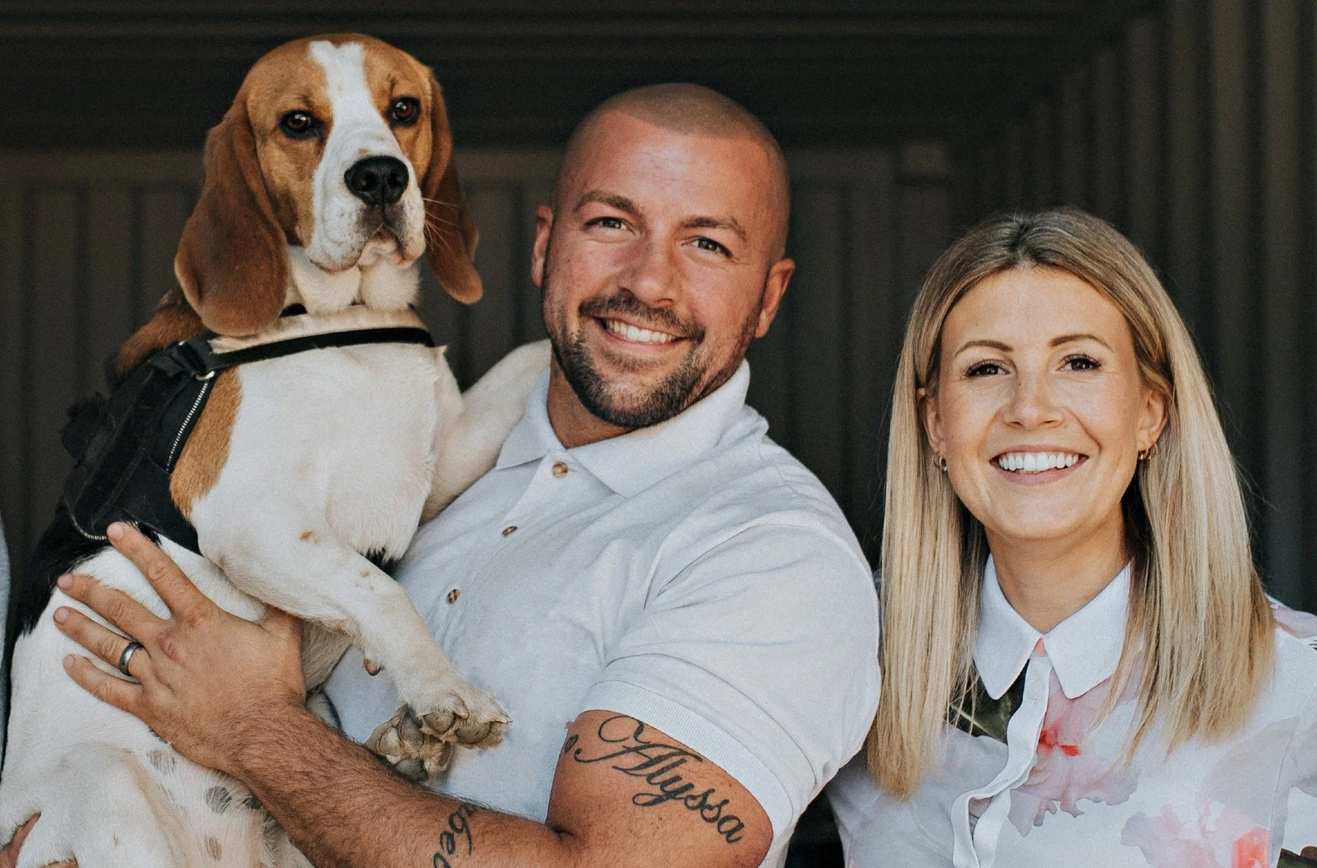 Daryl and Nikki Cooke, directors of RMG Construction & Energy Ltd, with their dog