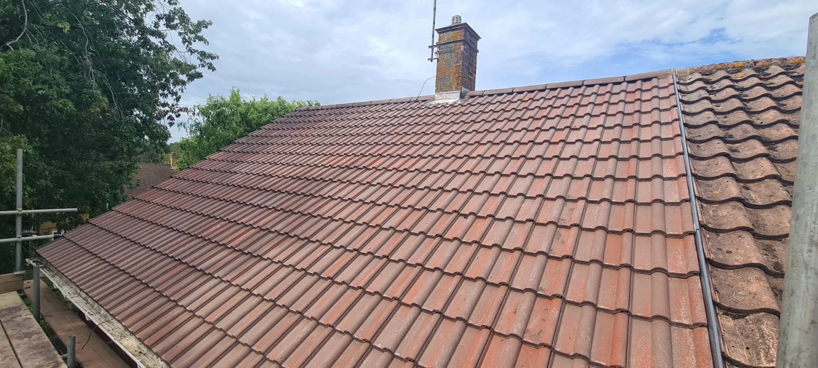 New pantile roof with a rebuilt chimney