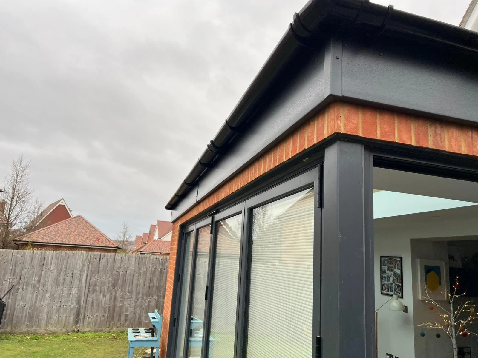 New black fascias and soffits on a contemporary extension