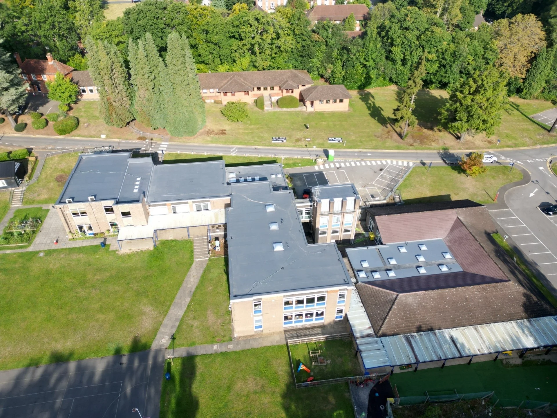 Aerial drone view of a school estate roof during a condition survey