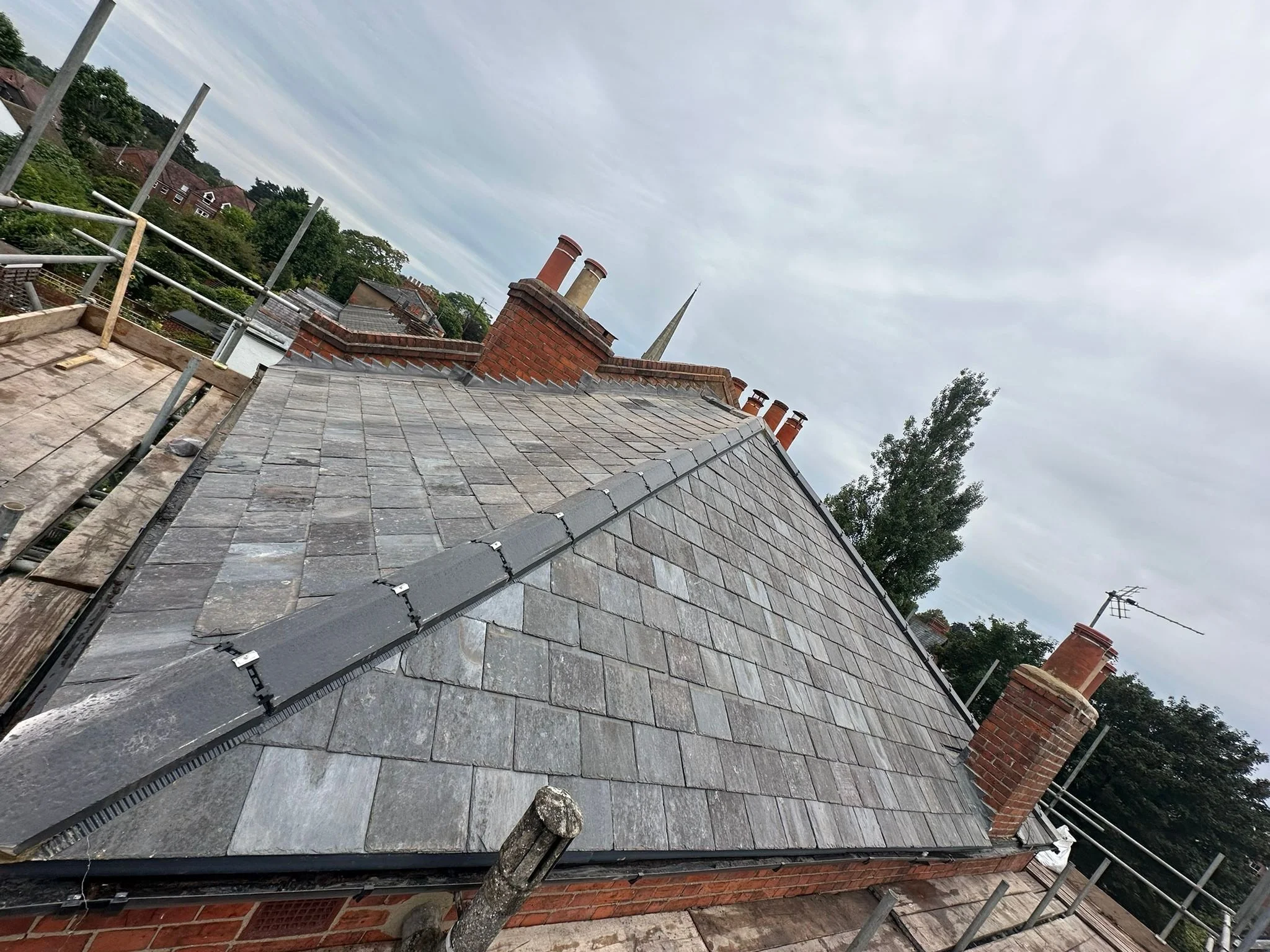 Re-slated roof and repointed chimney on a period house