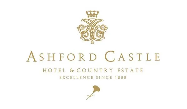 Ashford Castle logo with a crown, ornate monogram, and text stating "Hotel & Country Estate, Excellence Since 1228," on a white background.